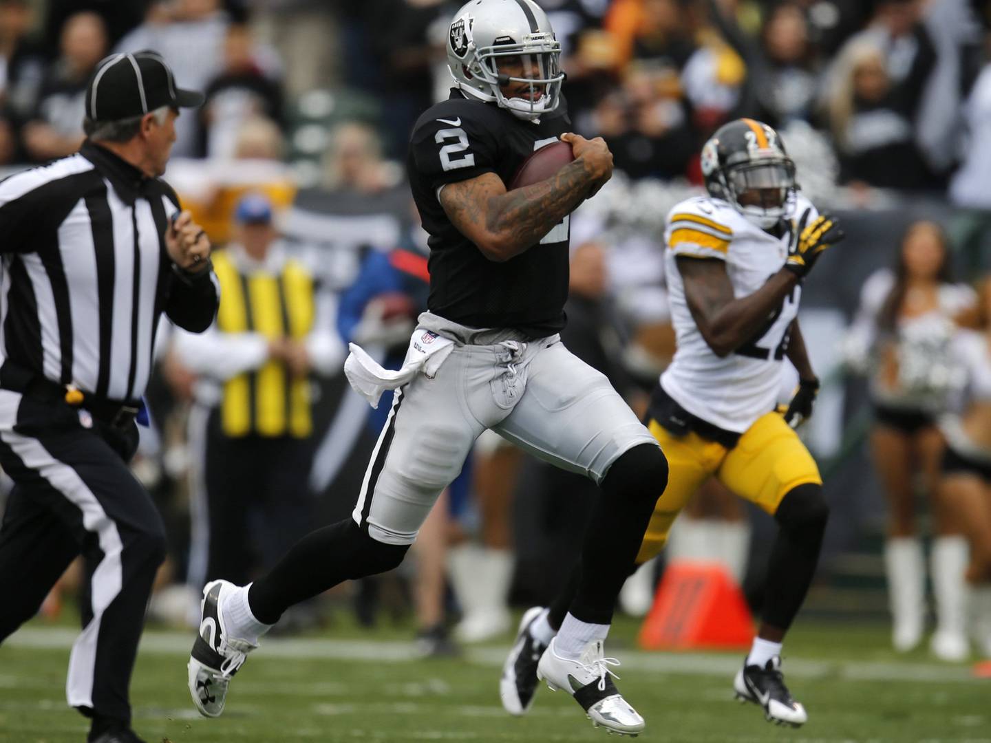 Raiders quarterback Terrelle Pryor runs for a 93-yard touchdown against the Steelers on Oct. 27, 2013, in Oakland, Calif. 