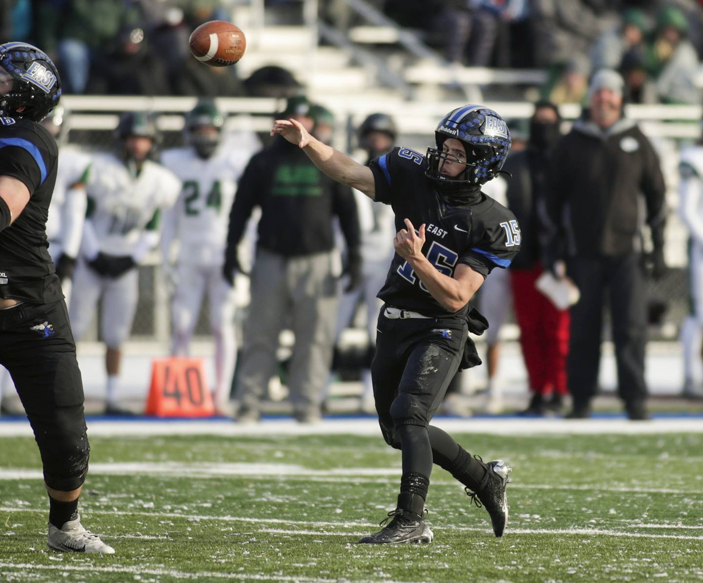Lincoln-Way East’s Braden Tischer passes for a touchdown against Glenbard West during a Class 8A state semifinal game in Frankfort on Saturday, Nov. 19, 2022.