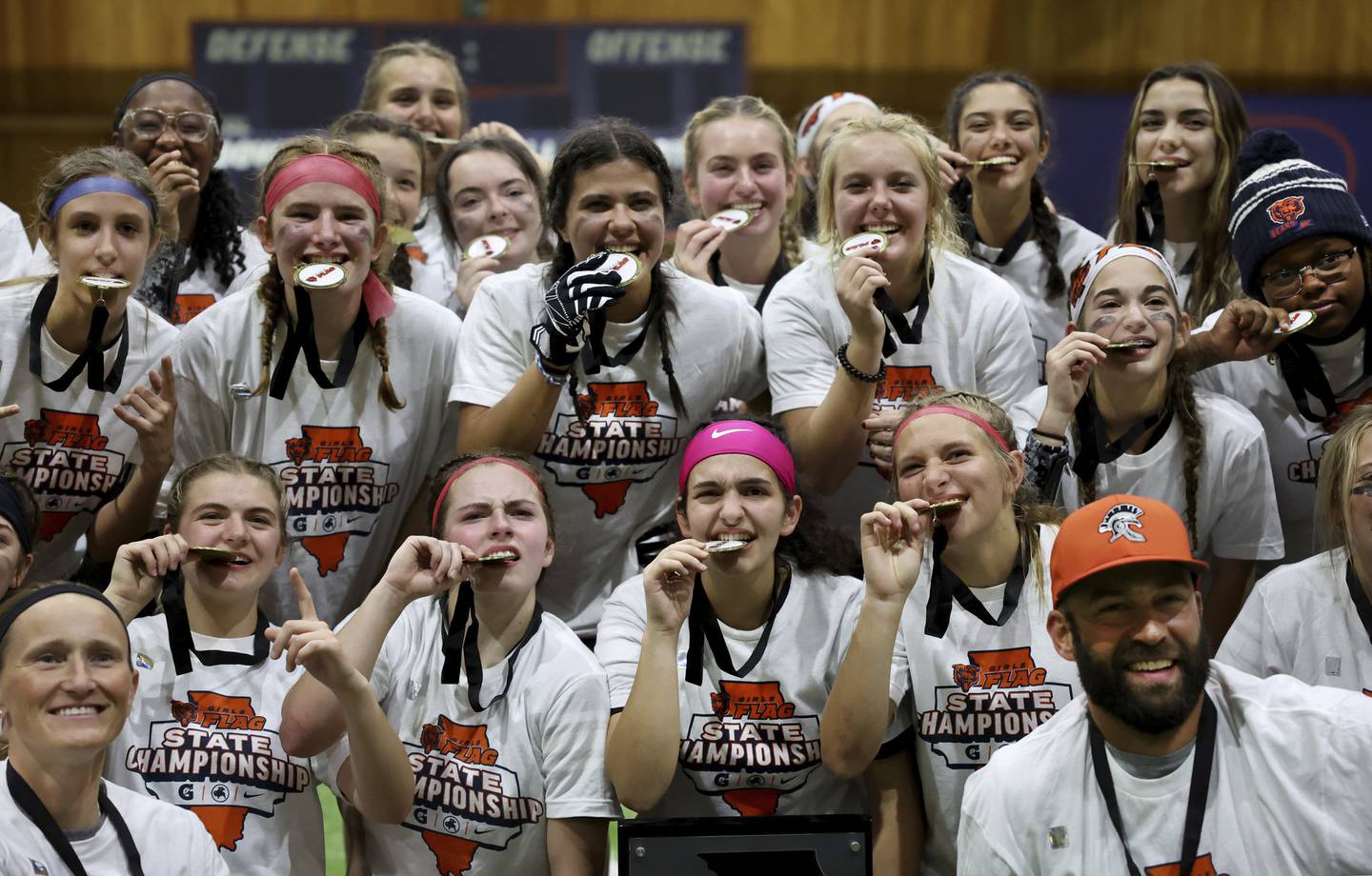 Willowbrook High School players celebrate their championship at the first-ever “Chicago Bears Girls Flag State Championship” at Halas Hall in Lake Forest.