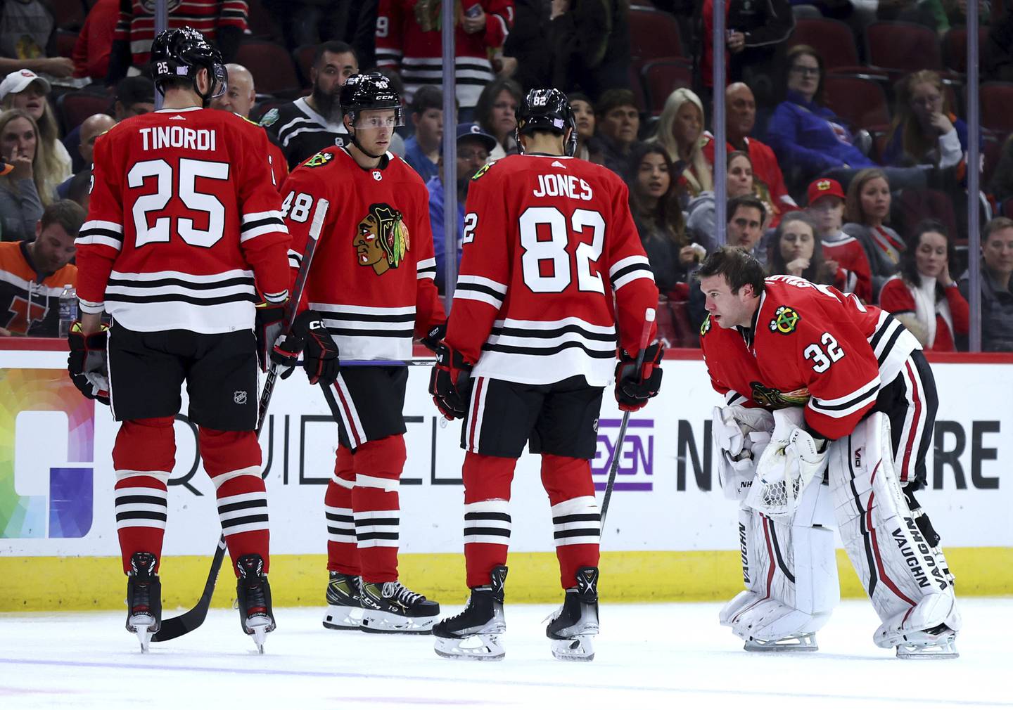 Blackhawks goaltender Alex Stalock skates off the ice after suffering an injury in the first period against the Islanders on Tuesday at the United Center. The Hawks on Wednesday placed Stalock in the concussion protocol.