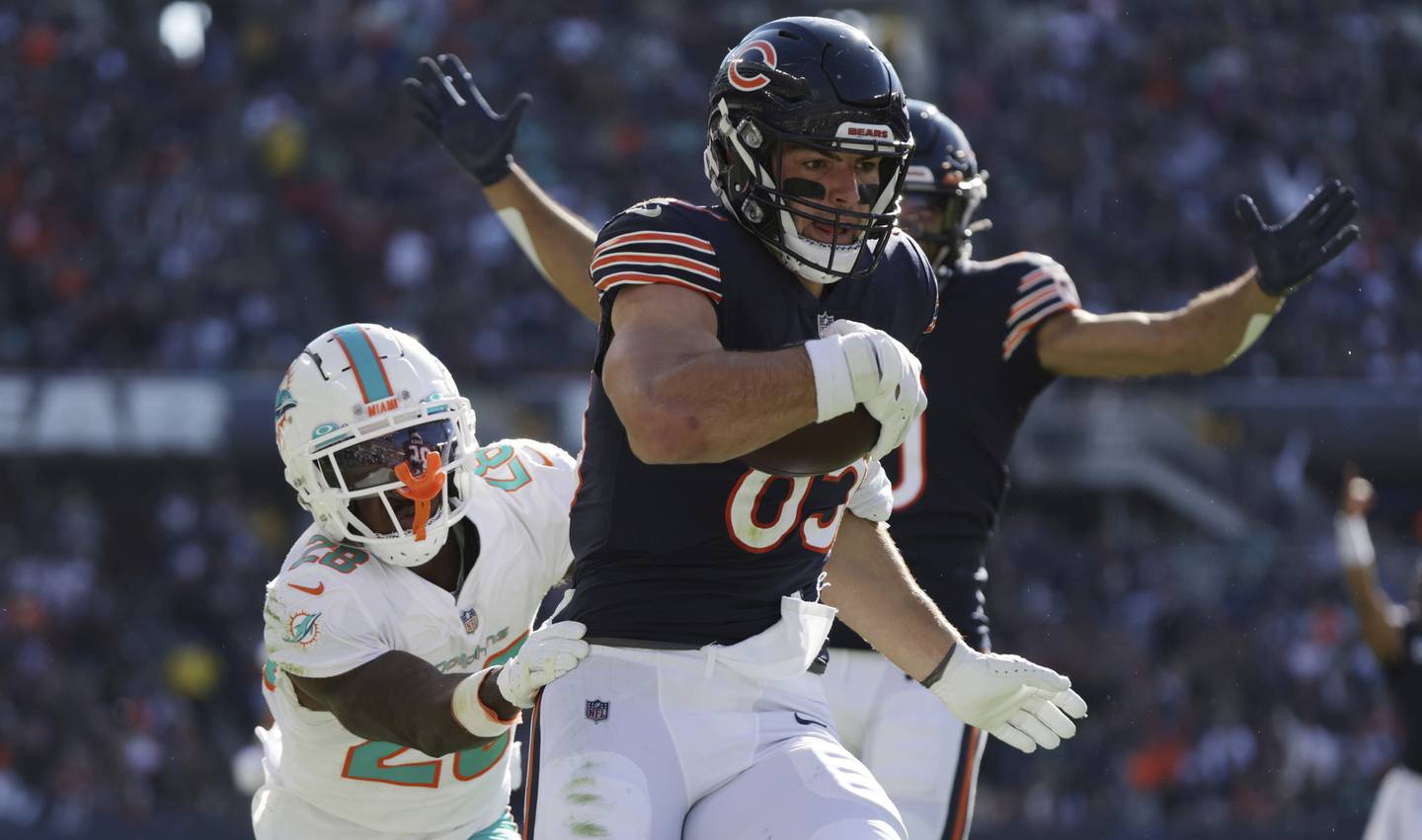 Bears tight end Cole Kmet scores a touchdown off a pass from Justin Fields in the second quarter against the Dolphins on Nov. 6, 2022, at Soldier Field. 