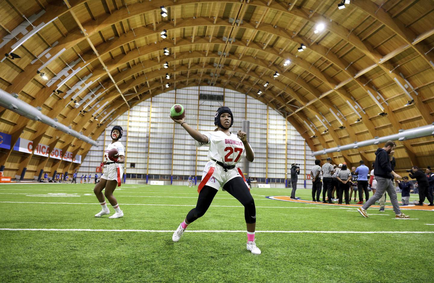 Kenwood Academy quarterback Trayce Brim-Harris warms up before their semifinal game at the first-ever “Chicago Bears Girls Flag State Championship” at Halas Hall in Lake Forest on Oct. 29, 2022.  