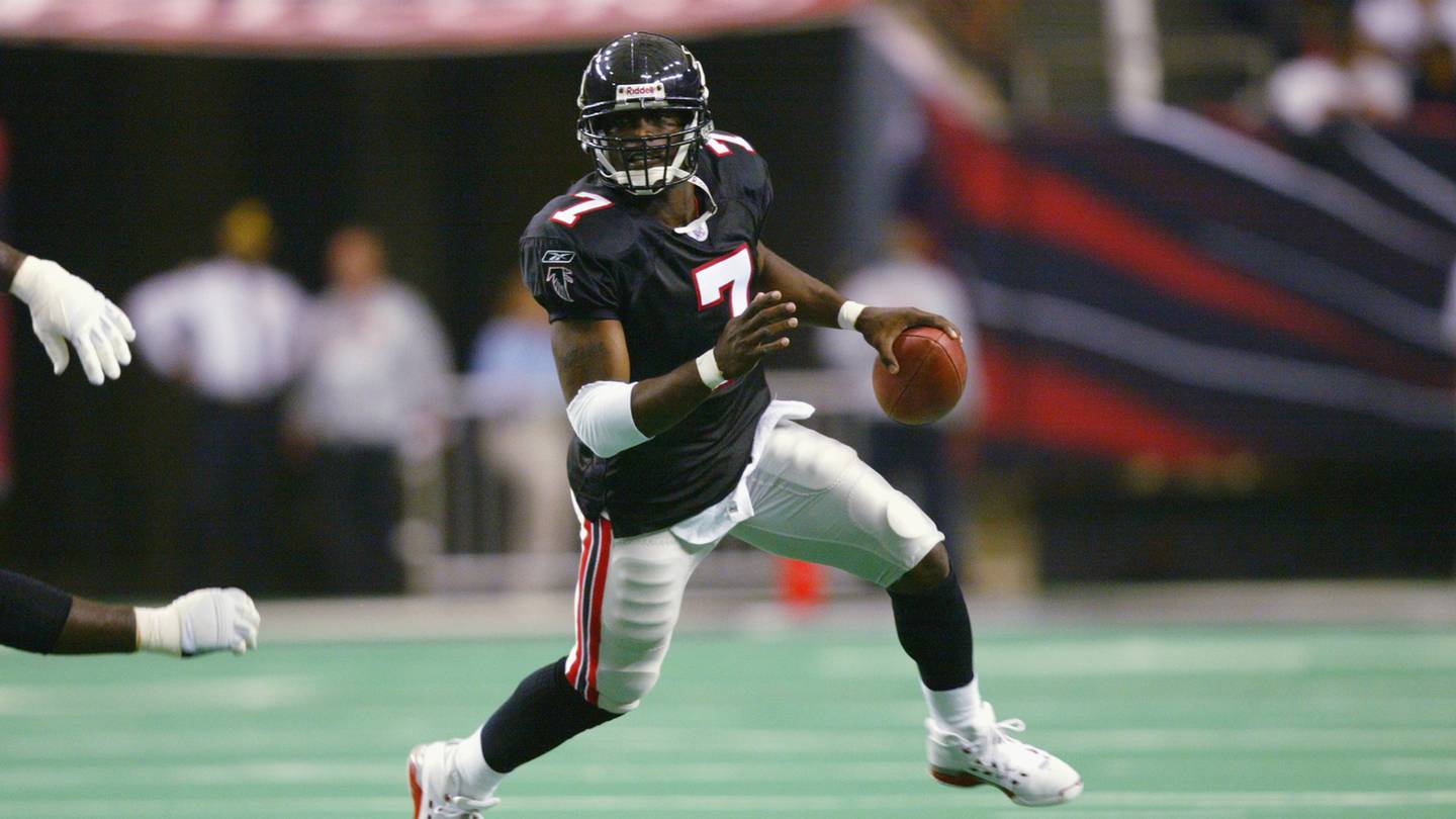Falcons quarterback Michael Vick scrambles against the Bears on Sept. 15, 2002, in Atlanta.