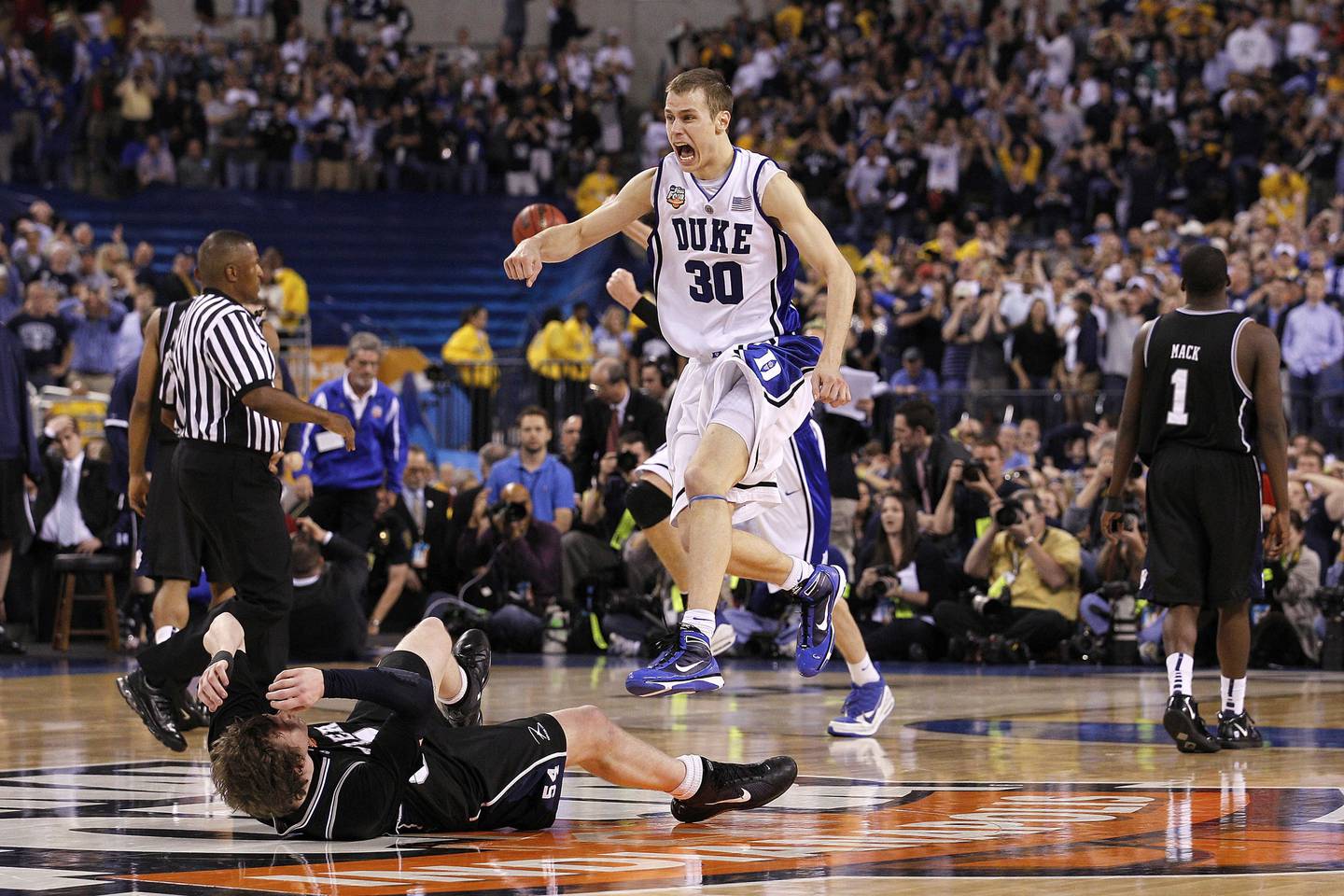 Duke's Jon Scheyer celebrates after the Blue Devils beat Butler 61-59 in the NCAA championship game on April 5, 2010, at Lucas Oil Stadium in Indianapolis.