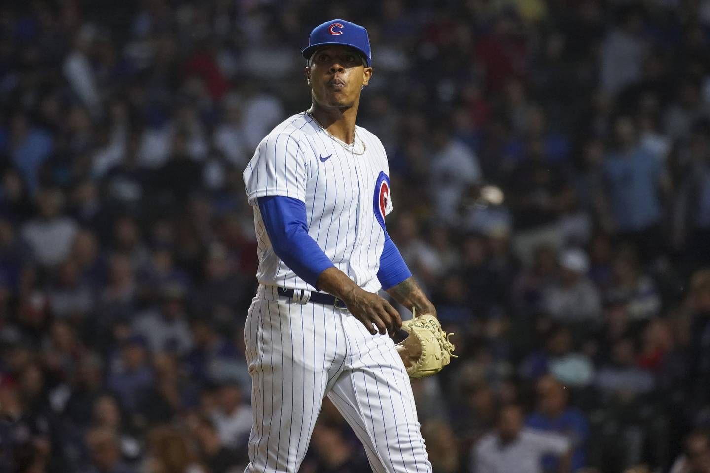 Cubs pitcher Marcus Stroman walks to the dugout during a game against the Nationals on Aug. 9, 2022, at Wrigley Field.