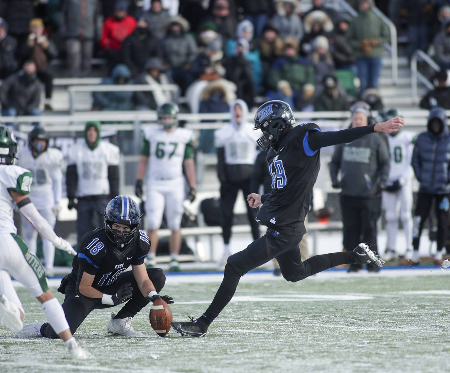 Lincoln-Way East’s Carter Nair (49) kicks a 43-yard field goal against Glenbard West during a Class 8A state semifinal game in Frankfort on Saturday, Nov. 19, 2022.