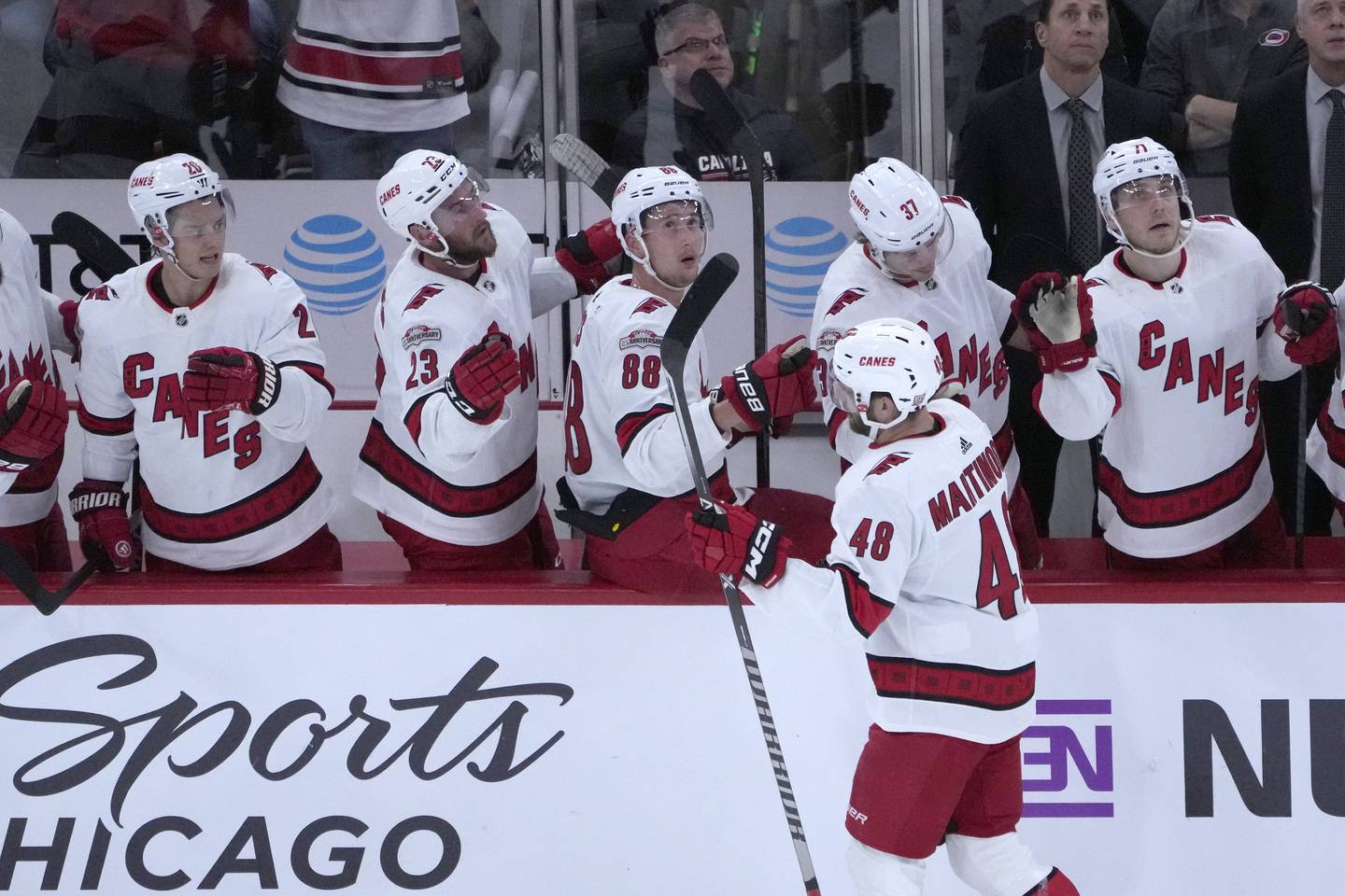 Hurricanes' Jordan Martinook celebrates his goal with teammates during the first period against the Blackhawks on Nov. 14, 2022.