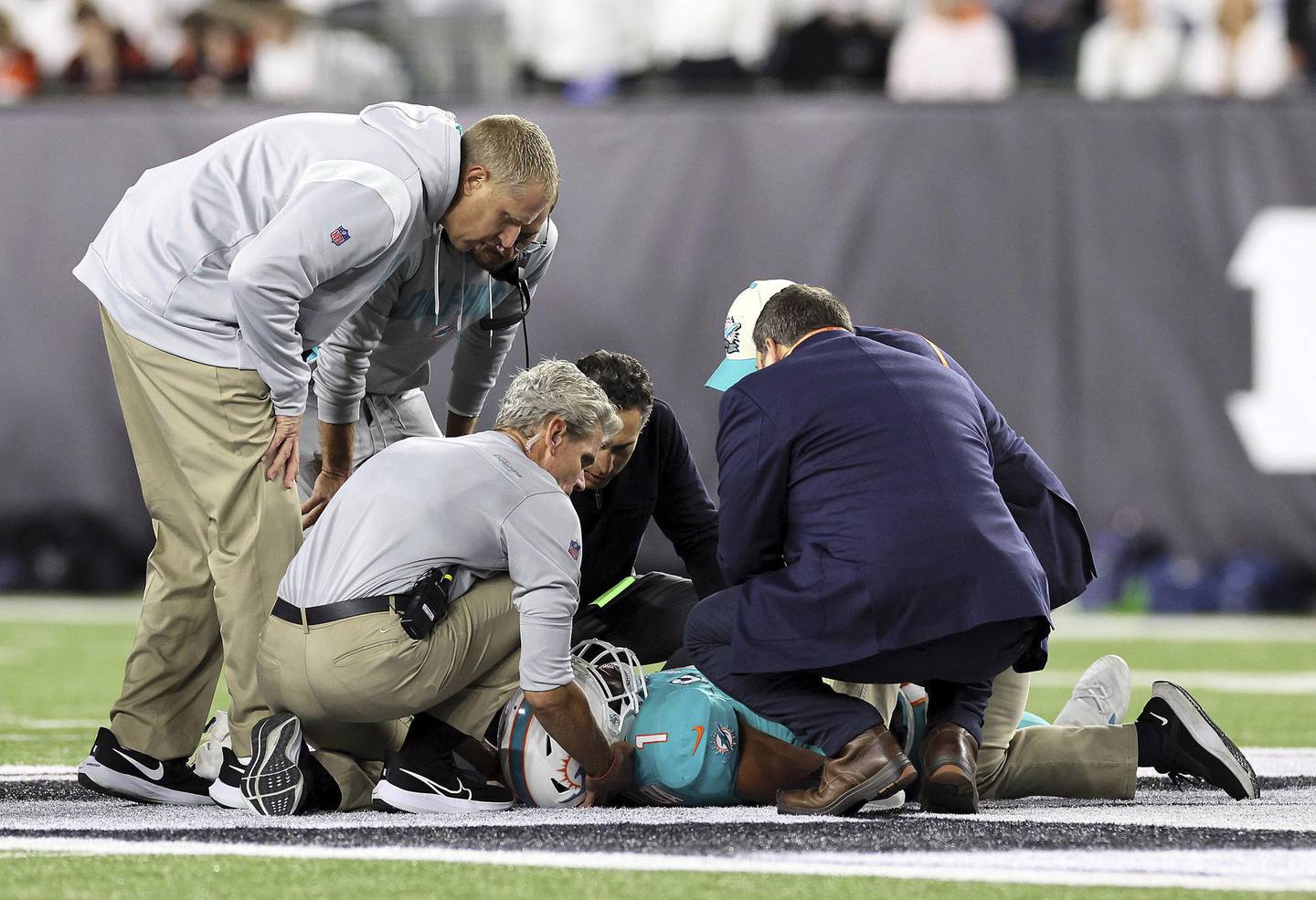 Medical staff tend to Dolphins quarterback Tua Tagovailoa after an injury during the second quarter against the Bengals on Sept. 29 at Paycor Stadium in Cincinnati. 