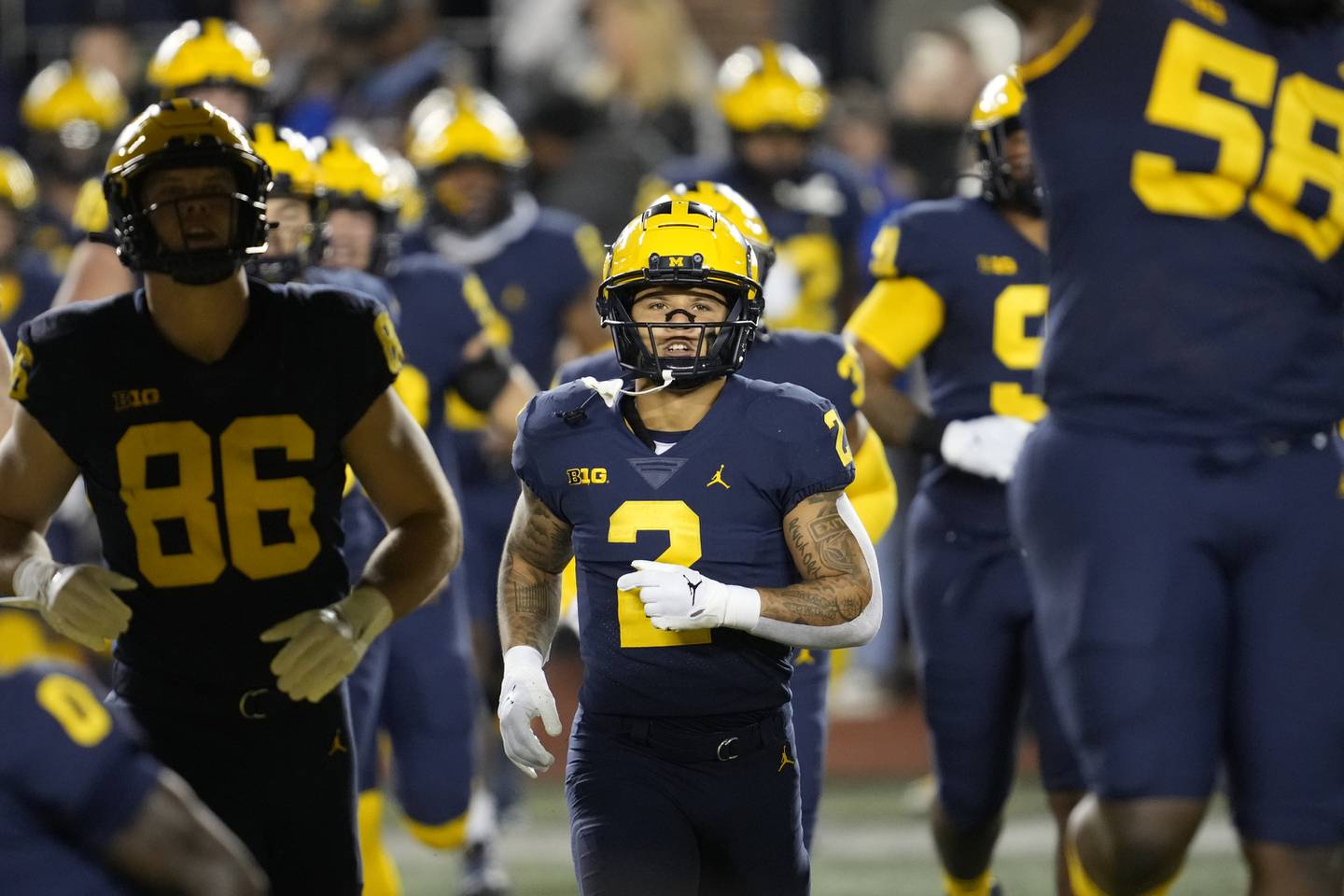 Michigan and running back Blake Corum (2) have a path to returning to the College Football Playoff if they can get past Ohio State.