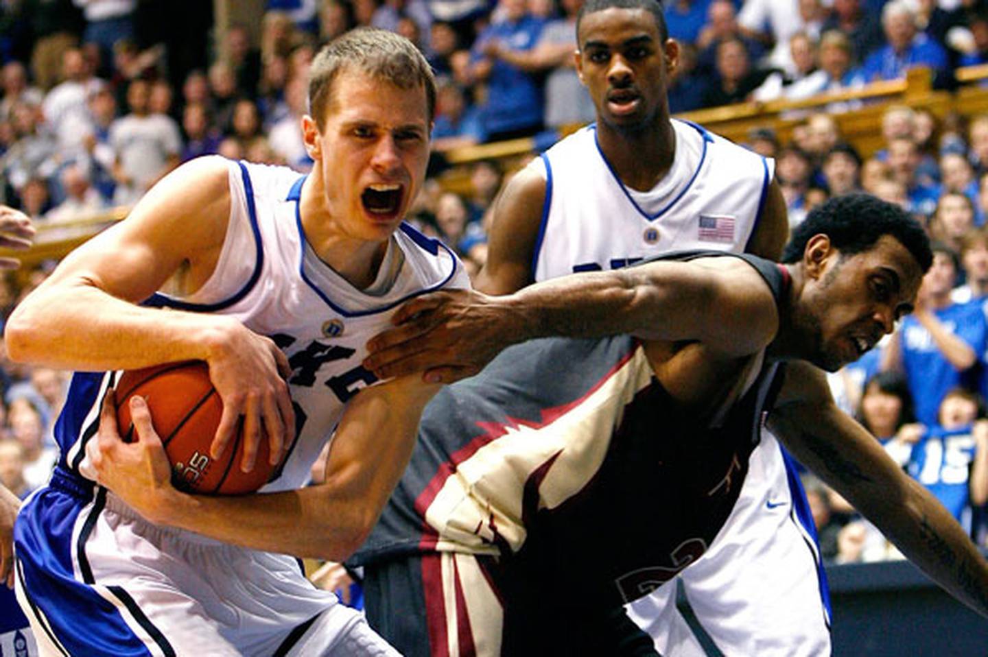 Duke's Jon Scheyer grabs a rebound against Florida State on March 3 at Cameron Indoor Stadium in Durham, N.C.