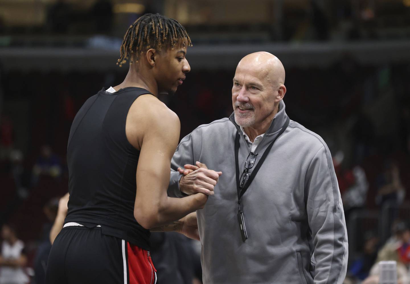 Bulls guard Dalen Terry greets senior adviser of basketball operations John Paxson before a game against the Nuggets on Sunday, Nov. 13, 2022, at the United Center.