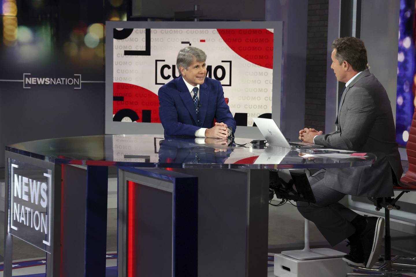 Former Illinois Gov. Rod Blagojevich, left, speaks to NewsNation host Chris Cuomo on air in the studio on Nov. 7, 2022.  