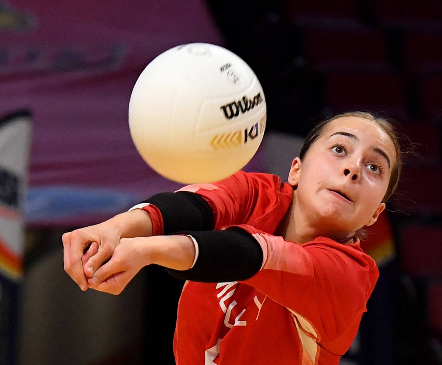 Mother McAuley's Gigi Navarrete (6) passes the ball against Benet during the Class 4A state championship match at Illinois State's Redbird Arena on Saturday, Nov. 12, 2022.