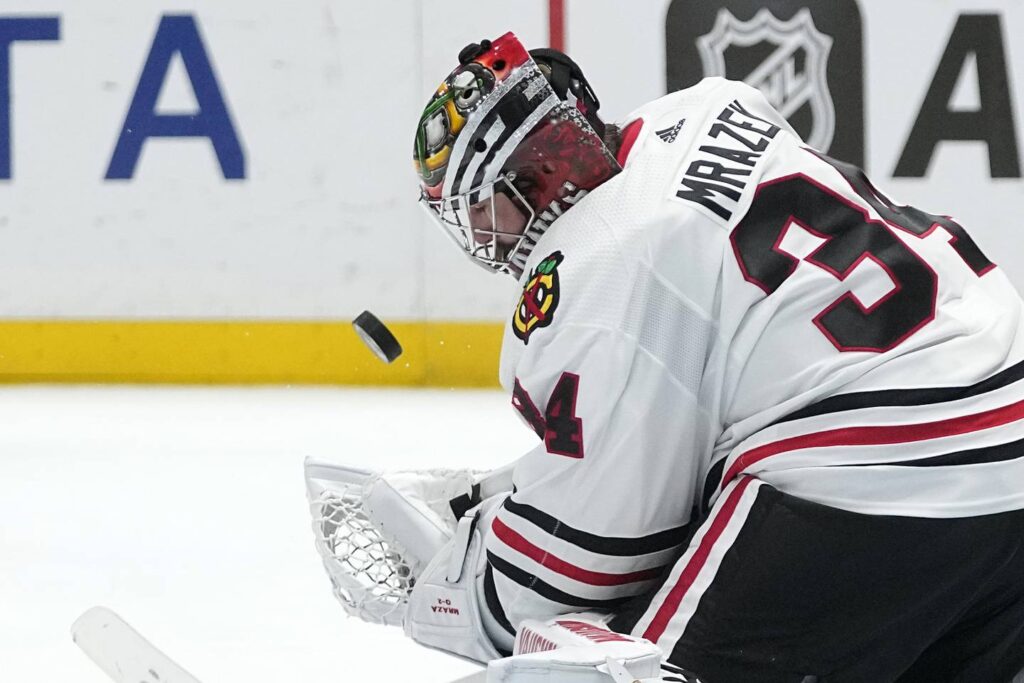 Petr Mrázek returns in top form, but the Chicago Blackhawks fall 2-1 to the Los Angeles Kings in overtime