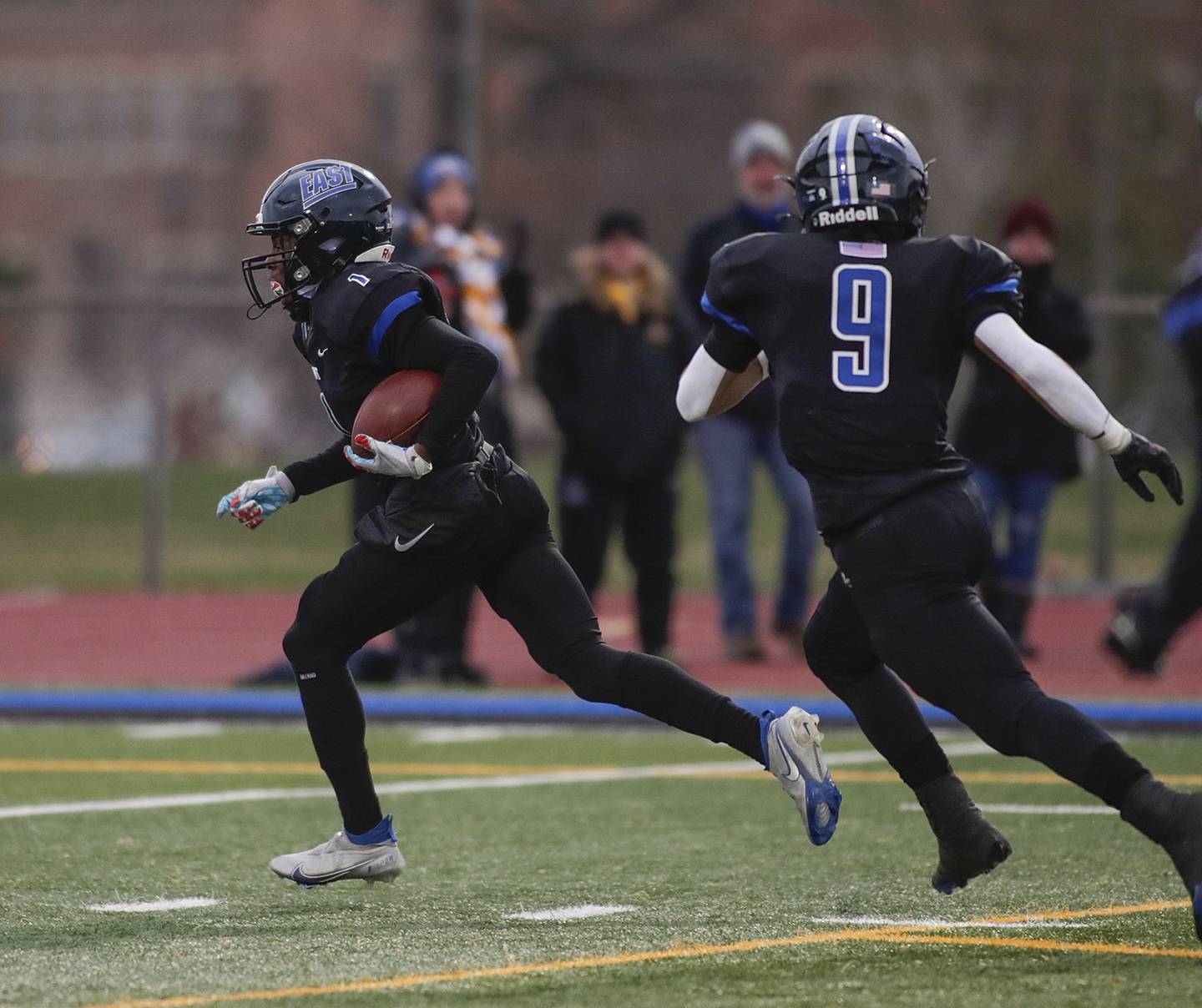 Lincoln-Way East’s Dylan Weathers (1) recovers a fumbled kickoff and runs it back for a touchdown against Warren during a Class 8A state quarterfinal game in Frankfort on Saturday, Nov. 12, 2022.
