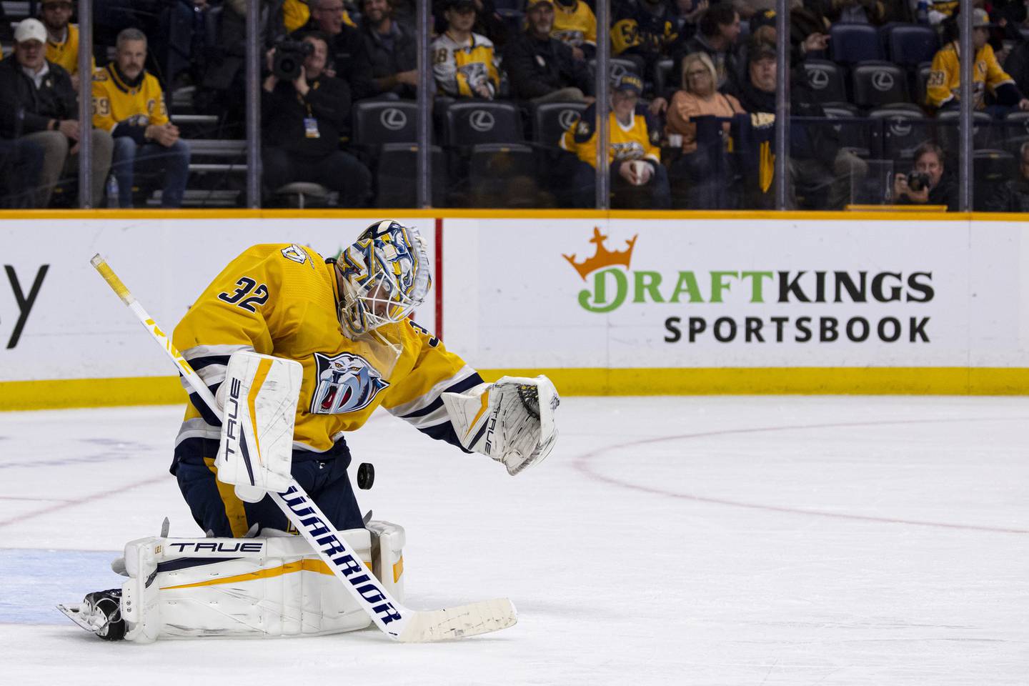 Predators goalie Kevin Lankinen makes a save against the Oilers on Dec. 13, 2022.