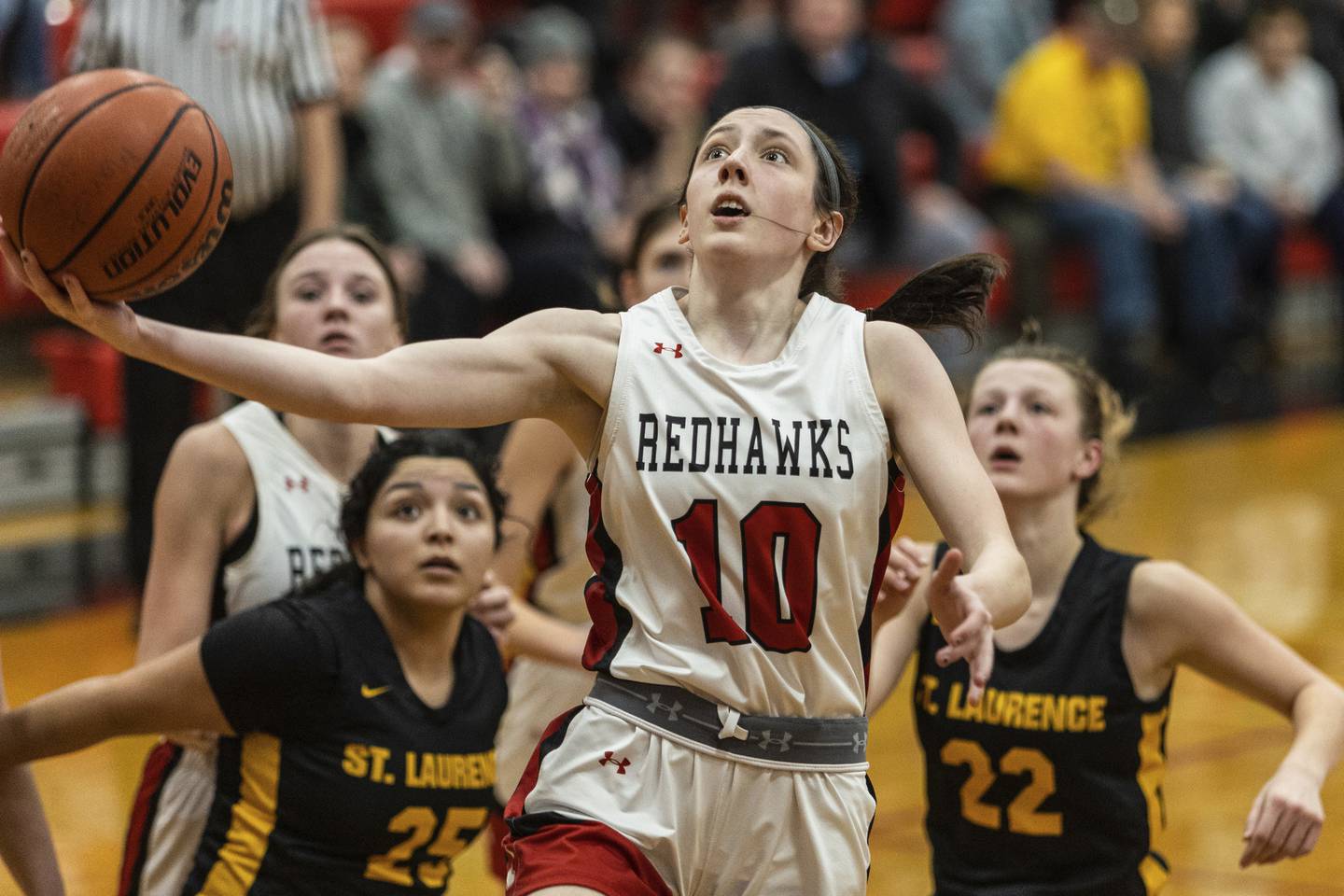 Marist’s Mary Kate Porter (10) goes up for a layup against St. Laurence during a nonconference game in Chicago on Monday, Dec. 19, 2022.