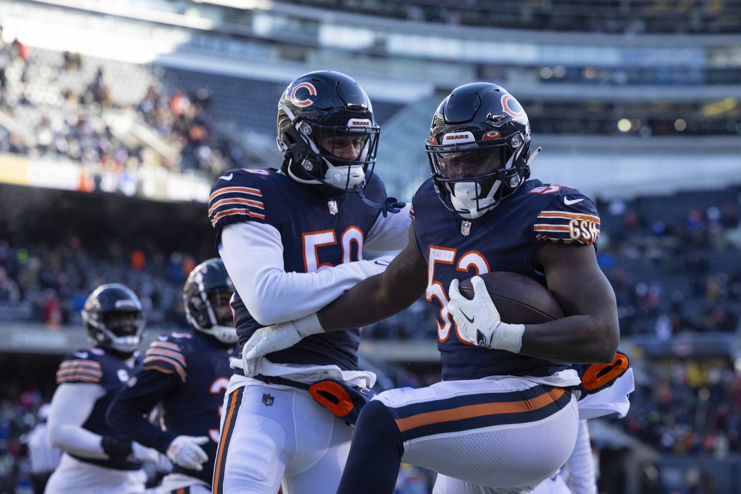Bears linebacker Nicholas Morrow celebrates after making an interception against the Bills on Saturday at Soldier Field. 
