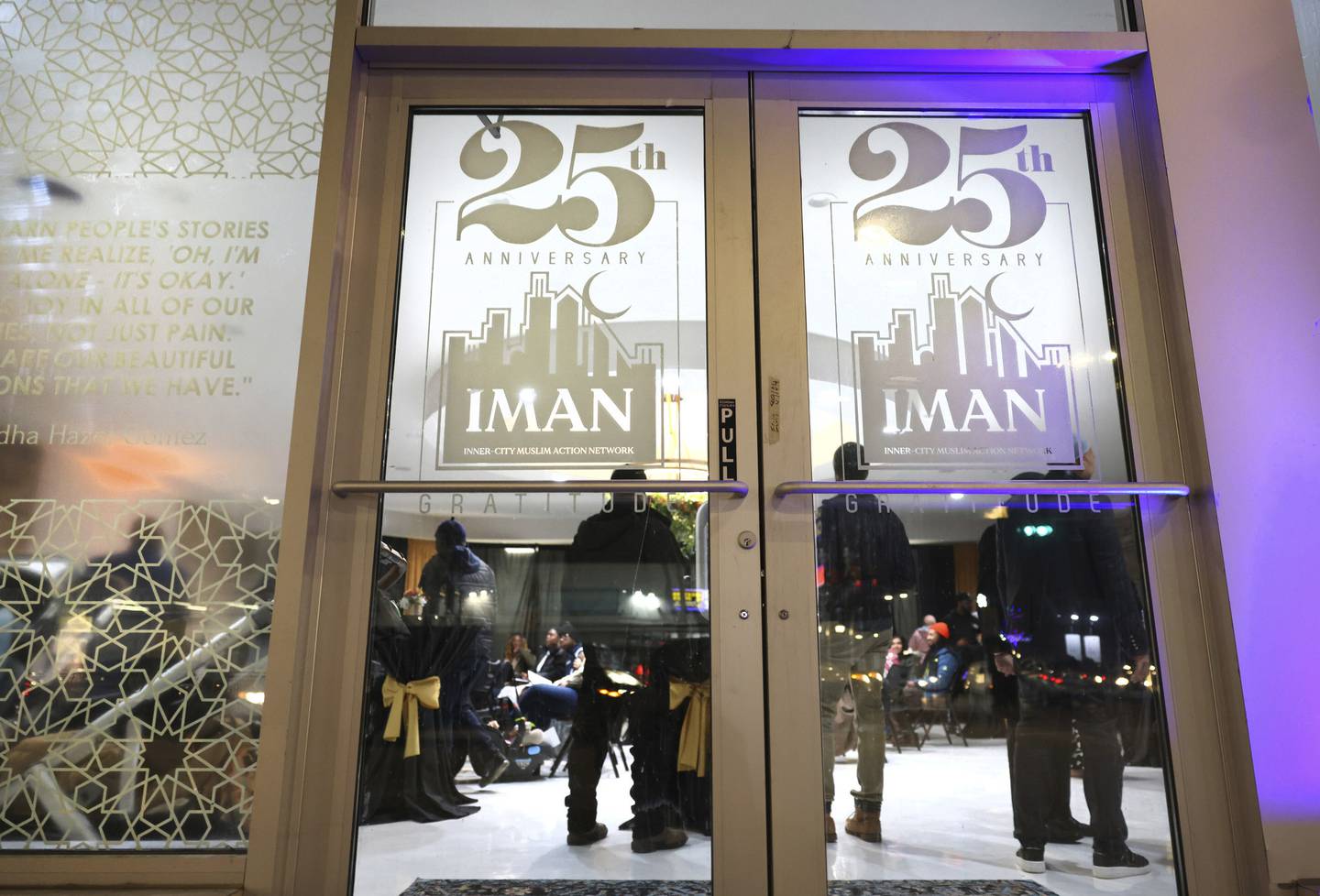 People tour the expanded Inner-City Muslim Action Network campus in the 2700 block of West 63rd Street in the Chicago Lawn neighborhood as IMAN celebrates its 25th anniversary on Dec. 1, 2022.  