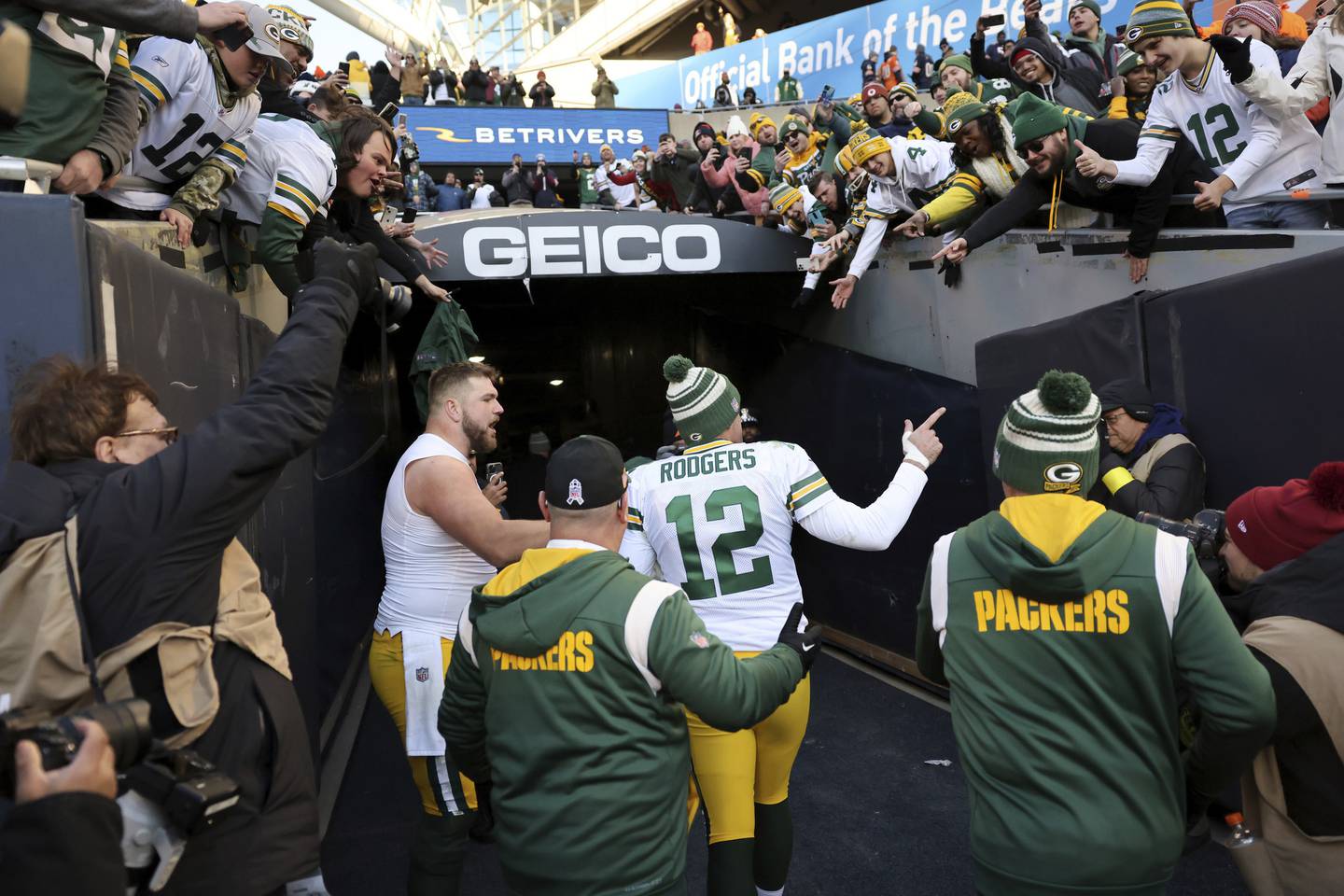 Packers quarterback Aaron Rodgers points to Packers fans in the stands as he exits Soldier Field after a victory over the Bears on Dec. 4, 2022.