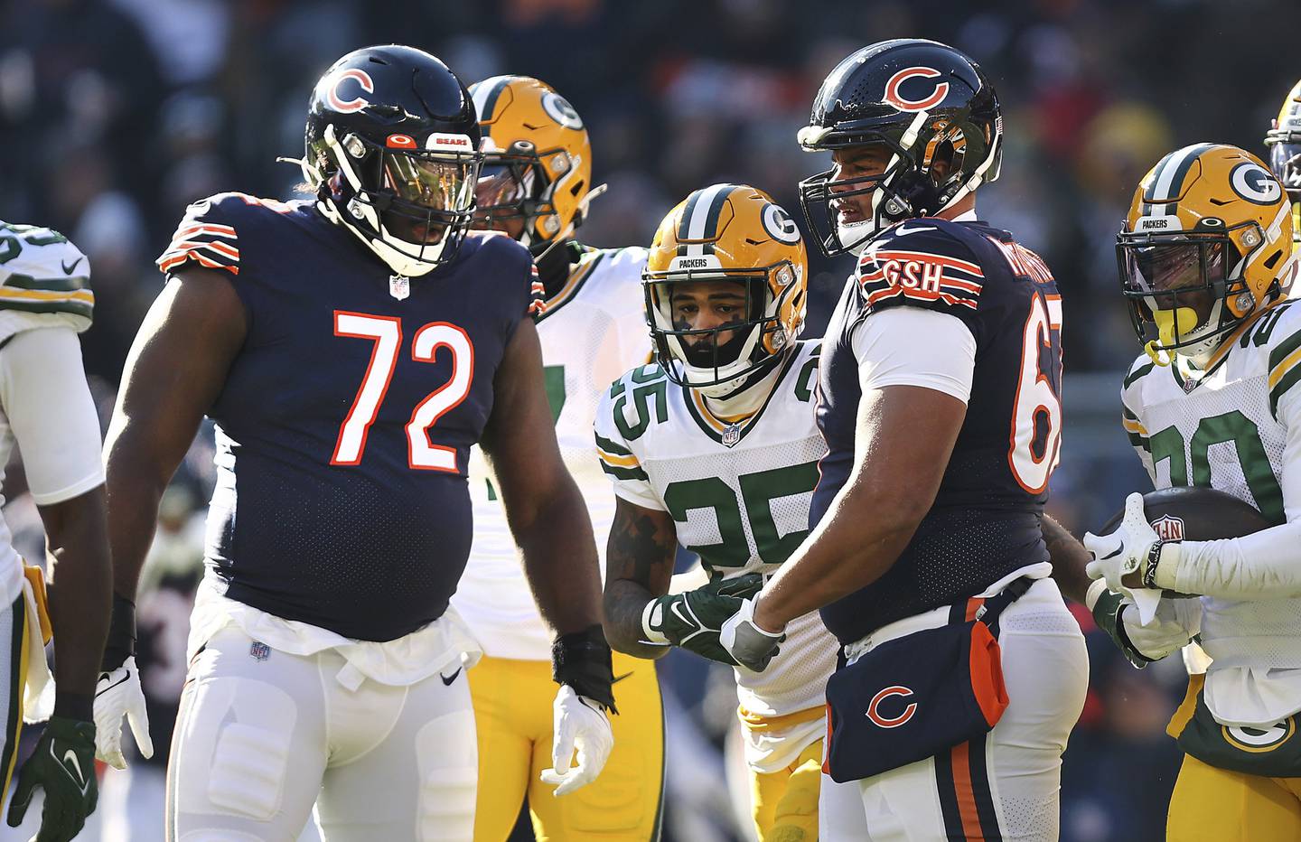 Bears offensive tackle Alex Leatherwood stands on the field during a break in the action against the Packers at Soldier Field on Dec. 4, 2022.