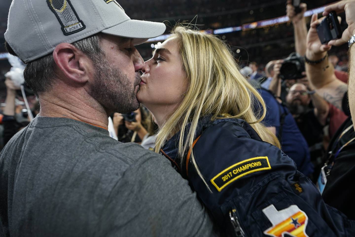 Houston Astros starting pitcher Justin Verlander kisses his wife Kate Upton as the team celebrates their 4-1 World Series win against the Philadelphia Phillies in Game 6 on Saturday, Nov. 5, 2022, in Houston. 