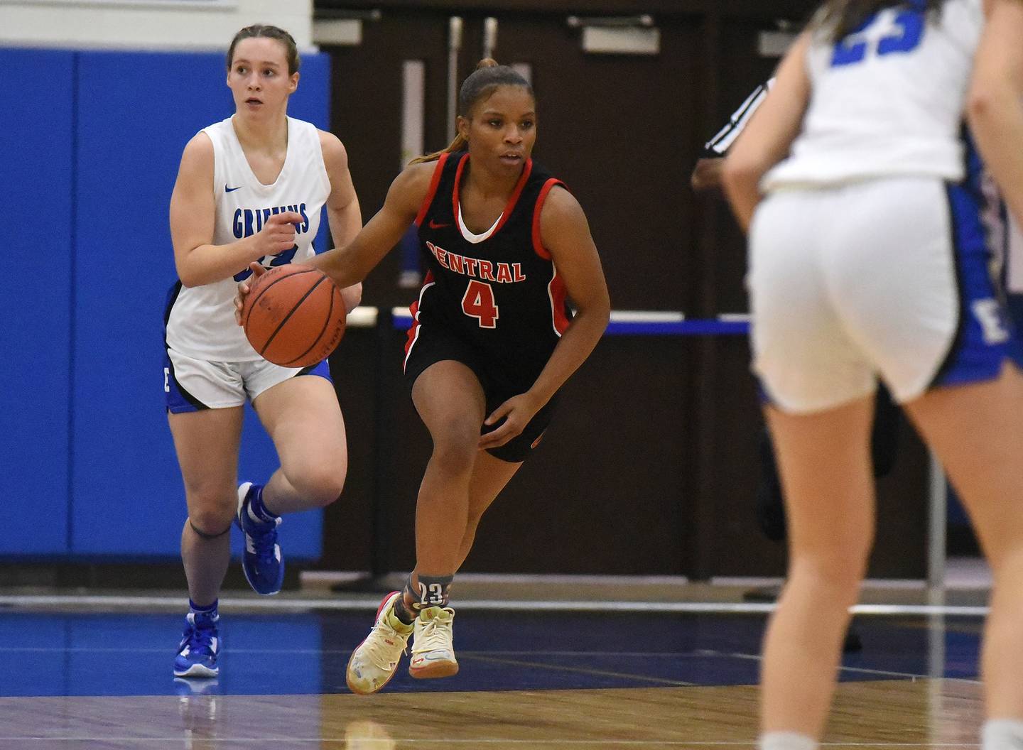 Lincoln-Way Central's Azyah Newson-Cole (4) works the ball up the court against Lincoln-Way East during a SouthWest Suburban Conference crossover in Frankfort on Tuesday, Dec. 6, 2022.