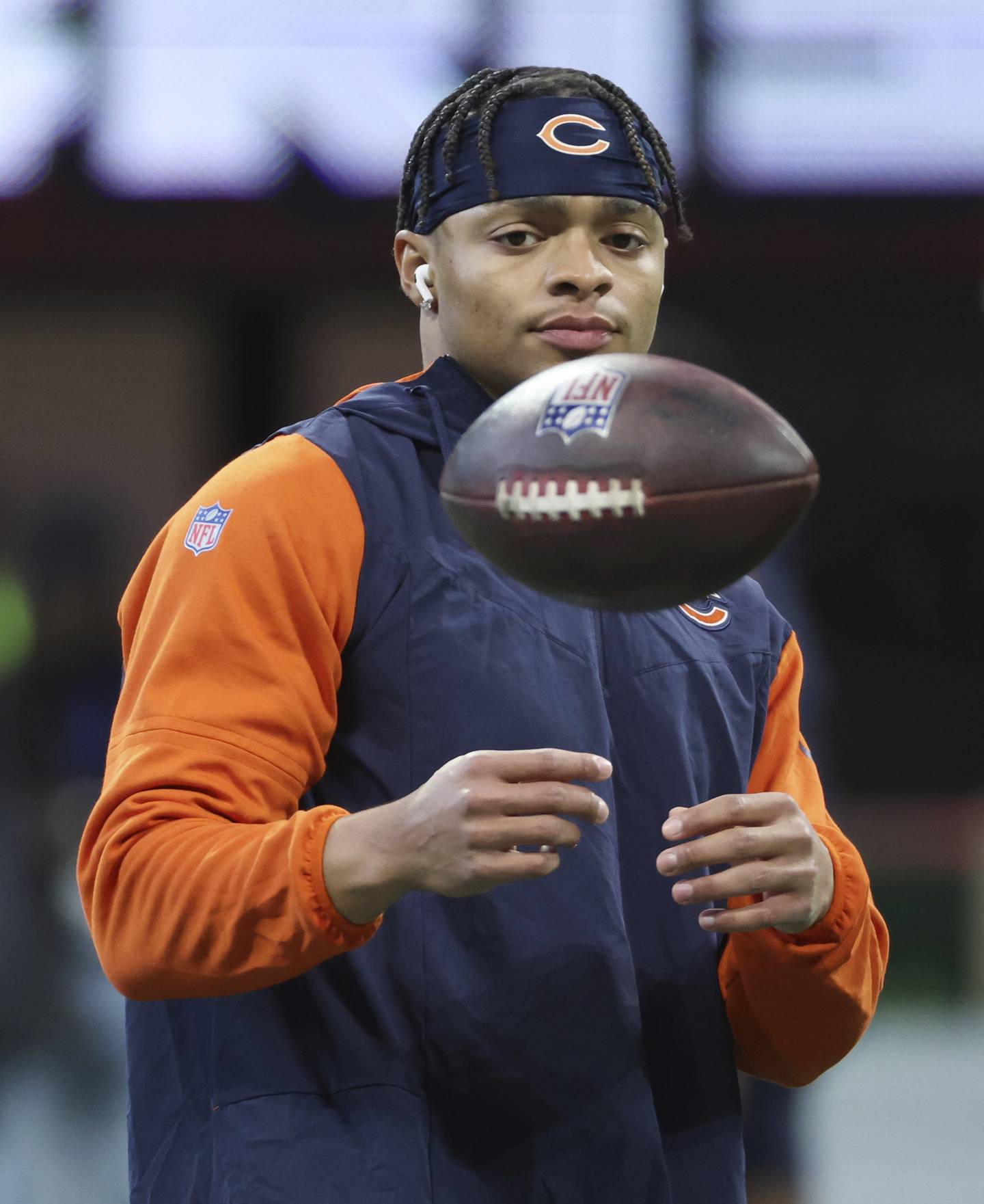 Bears quarterback Justin Fields warms up before a game against the Falcons at Mercedes-Benz Stadium on Nov. 20, 2022.