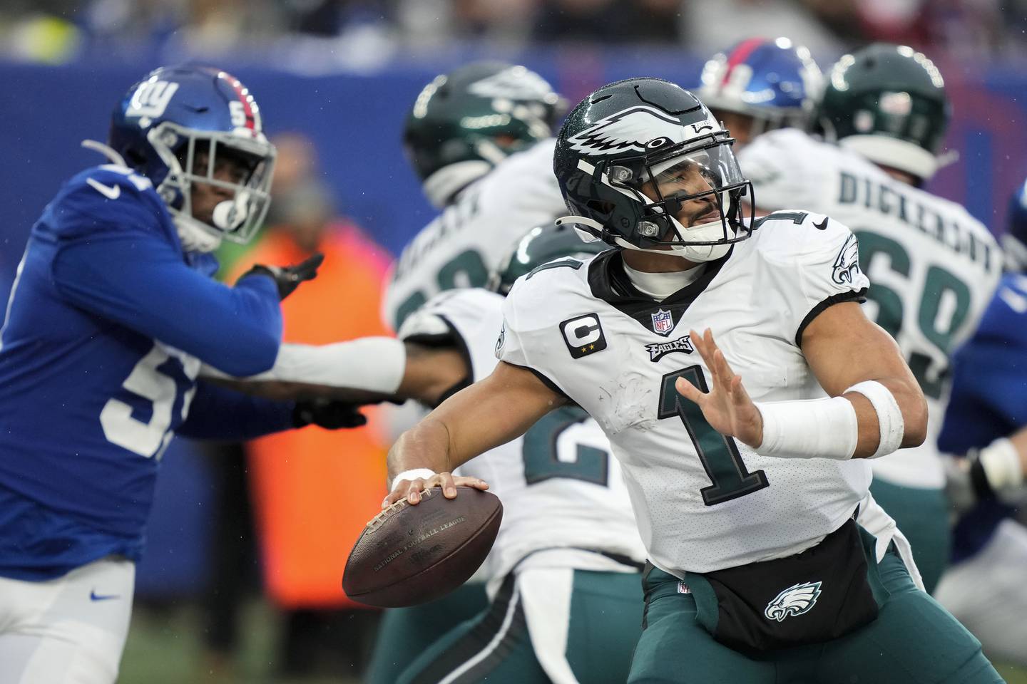 Eagles quarterback Jalen Hurts (1) passes against the Giants during the second quarter Sunday in East Rutherford, N.J.