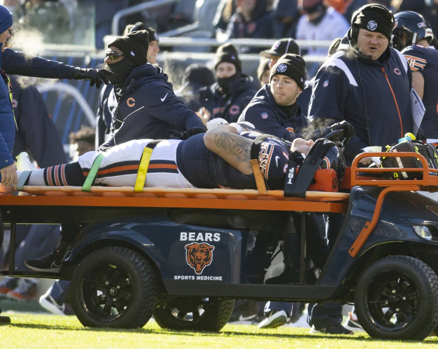 Bears offensive tackle Teven Jenkins leaves on a cart with an injury in the first quarter on Dec. 18, 2022, at Soldier Field.