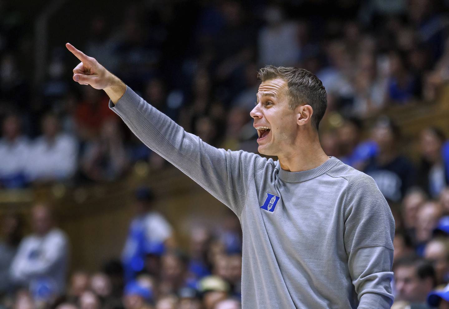 Duke coach Jon Scheyer gestures to players during the second half of a game on Nov. 11, 2022.