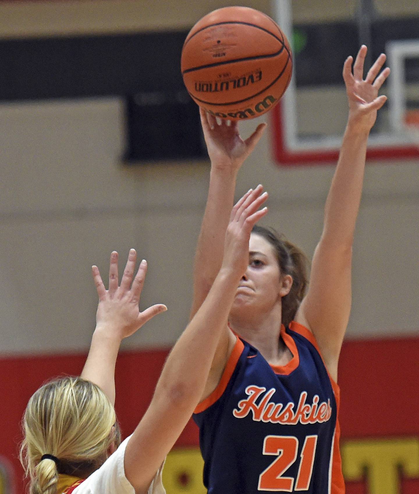 Naperville North’s Abby Drendel (21) puts up a 3-point shot during a game at Batavia on Saturday, Dec. 10, 2022. 