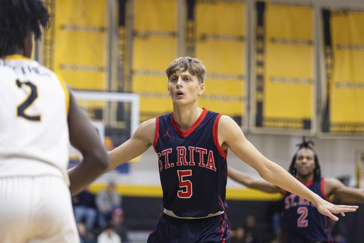 St. Rita's Nojus Indrusaitis (5) sets up on defense against St. Laurence during a Catholic League crossover in Burbank on Tuesday, Dec. 13, 2022.