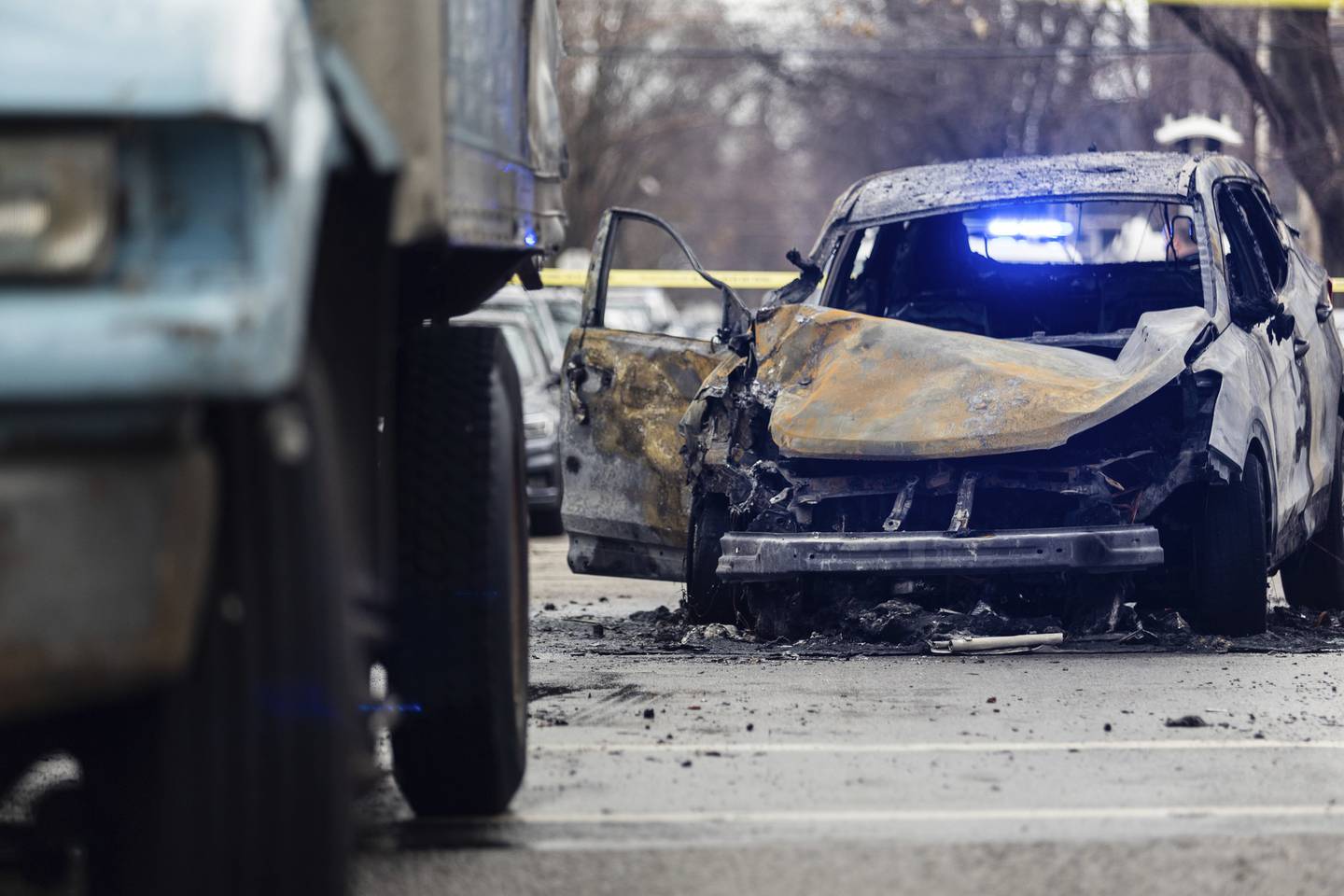 A police chase ended with suspects crashing into a Chicago Department of Streets and Sanitation truck at the corner of Oakley Avenue and Winona Street in the Ravenswood neighborhood of Chicago on Dec. 12, 2022. 