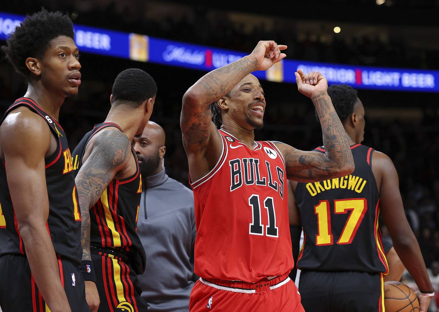 Bulls forward DeMar DeRozan reacts after Ayo Dosunmu hit the game-winning basket as time expired Dec. 21, 2022, in Atlanta.