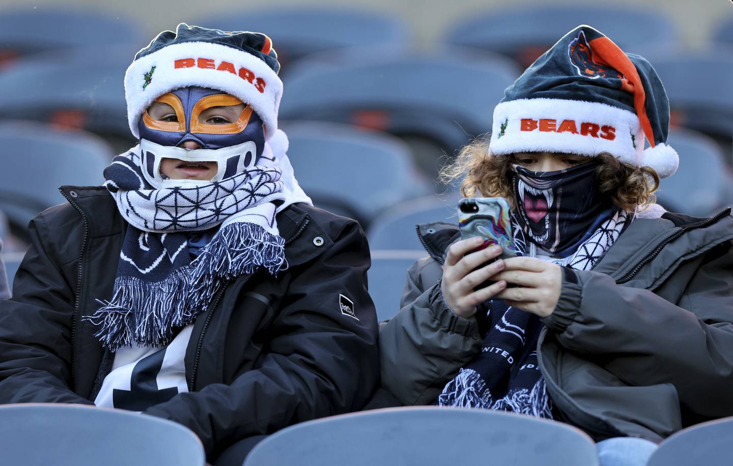 Bundled up Bears fans wait for the start of a game against the Eagles at Soldier Field on Dec. 18, 2022.