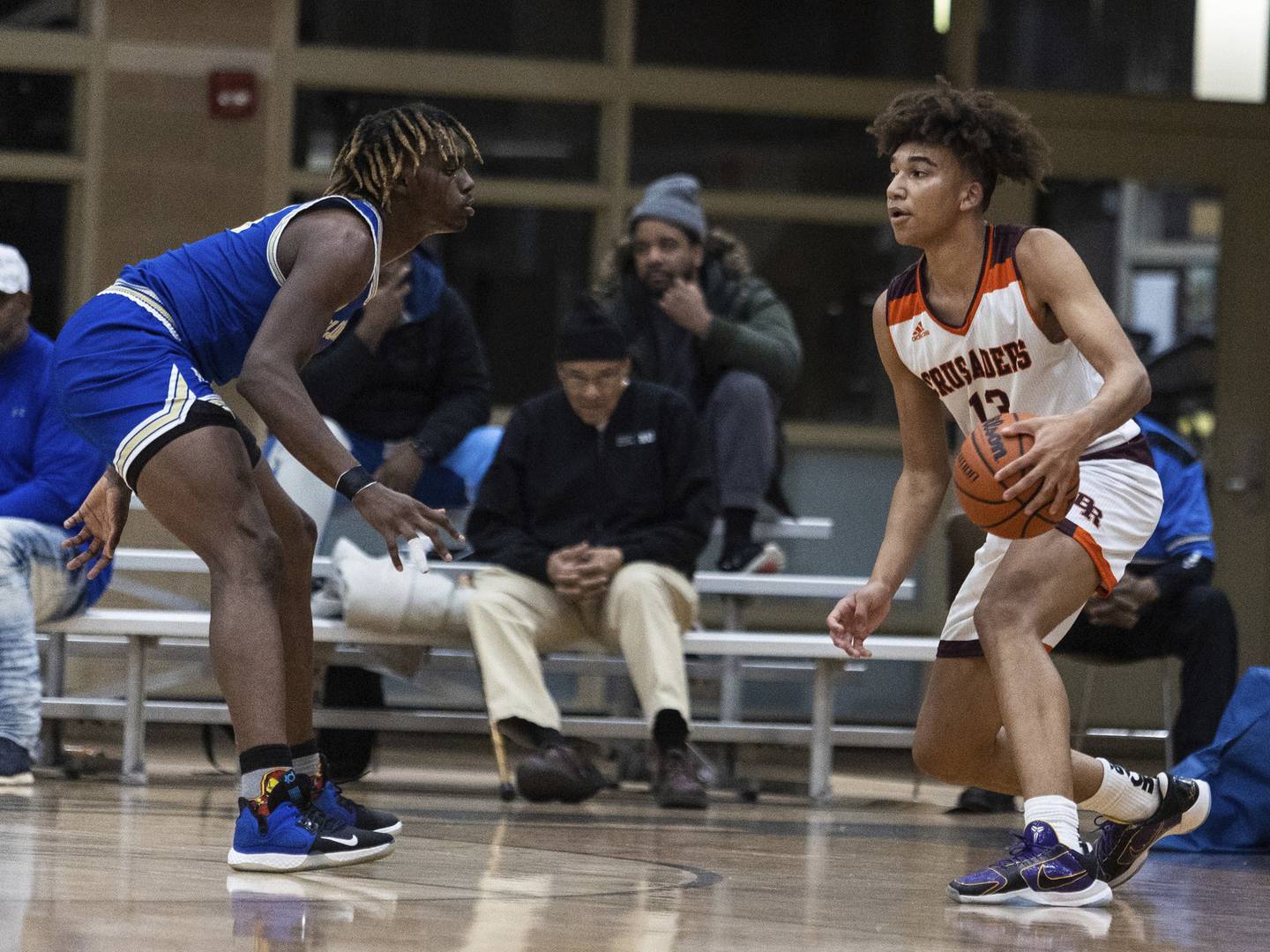 Brother Rice's Zavier Fitch (13) dribbles looking for an open lane against Bloom in the Team Rose Classic at Mount Carmel in Chicago on Sunday, Dec. 11, 2022.