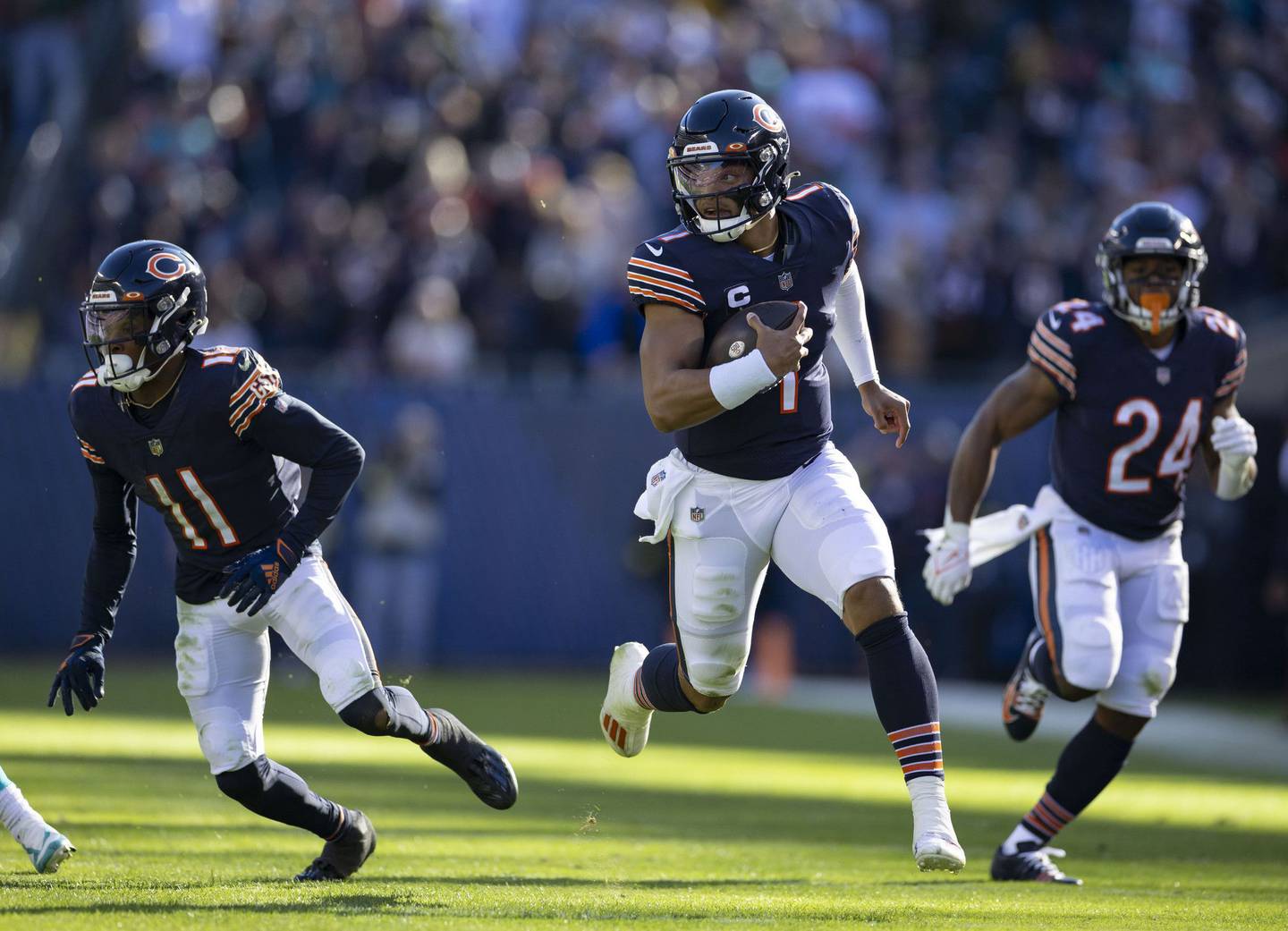 Bears quarterback Justin Fields runs for a 61-yard touchdown in the third quarter against the Dolphins on Nov. 6 at Soldier Field.