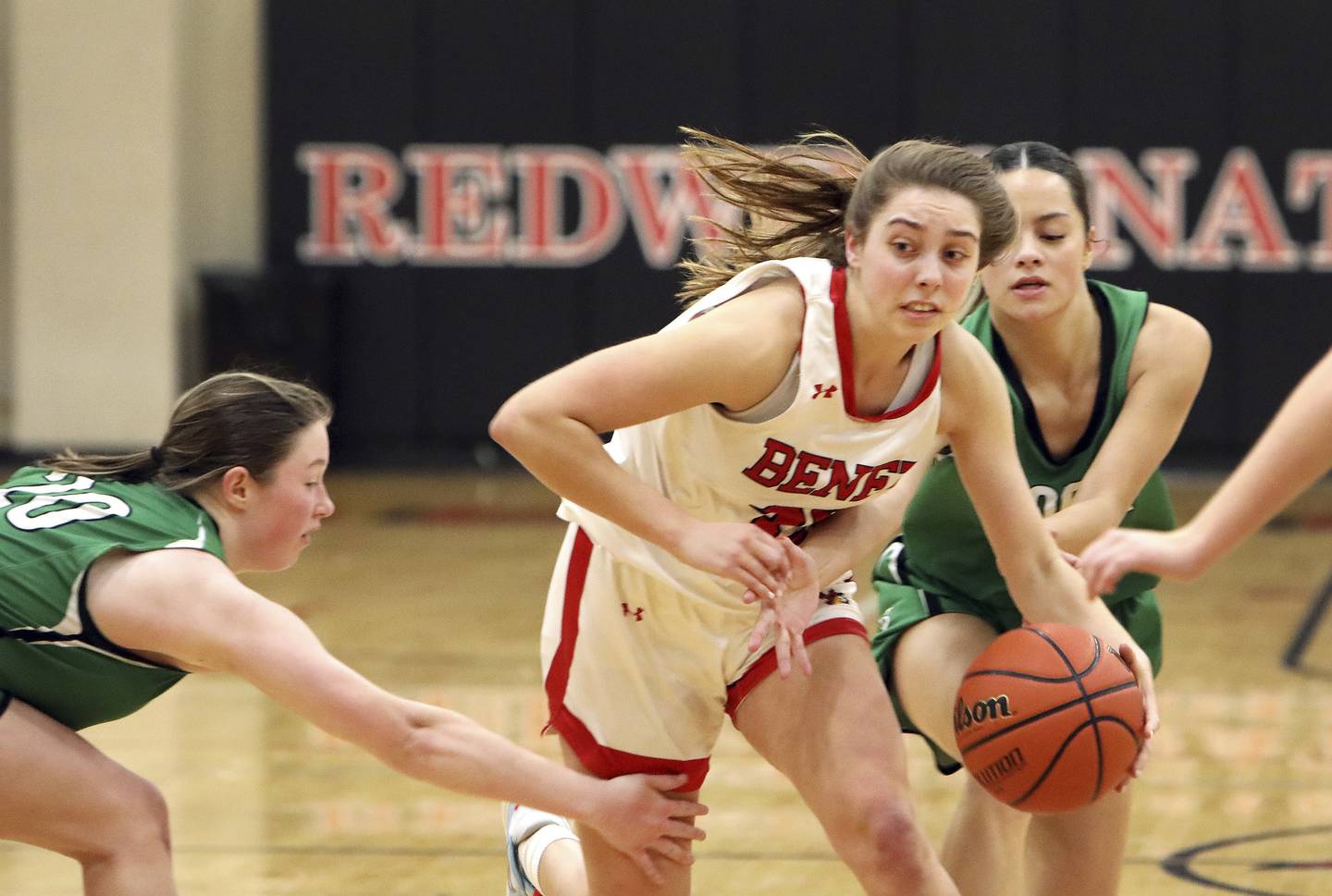 Benet’s Maggie Sularski pushes the ball up the court against York during a game in Lisle on Tuesday, Dec. 20, 2022.