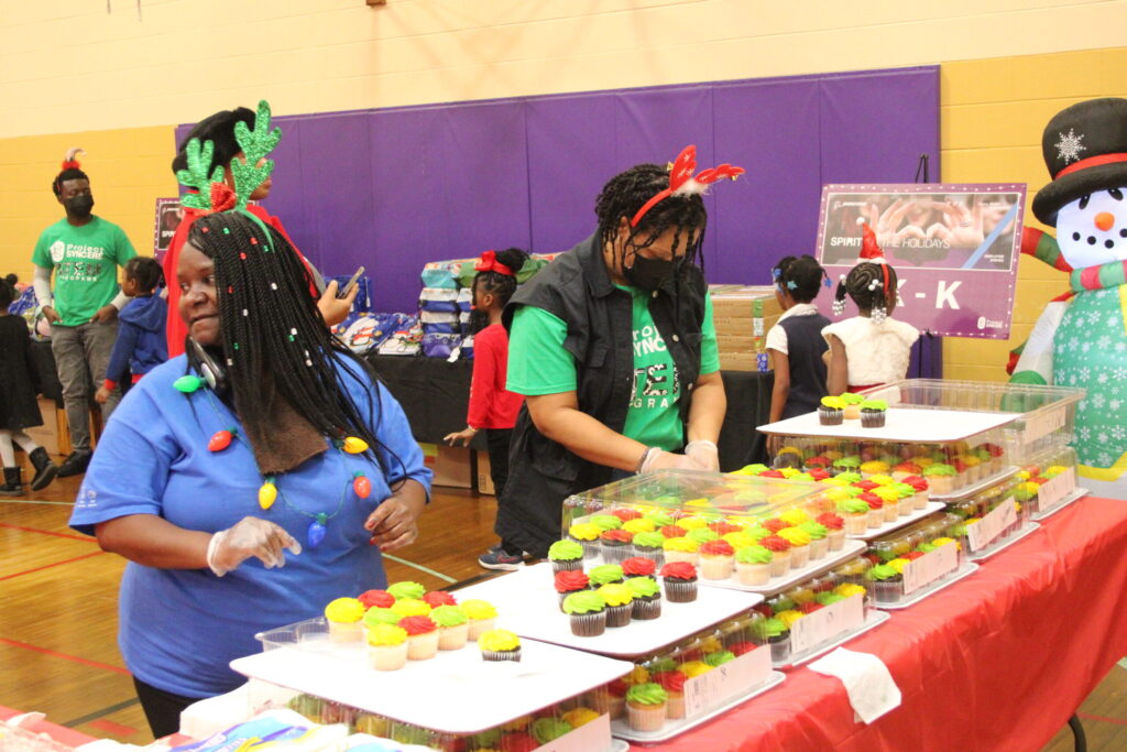 Students of Beveridge Elementary School receive Holiday gifts and Toys from Boeing, Project Syncere