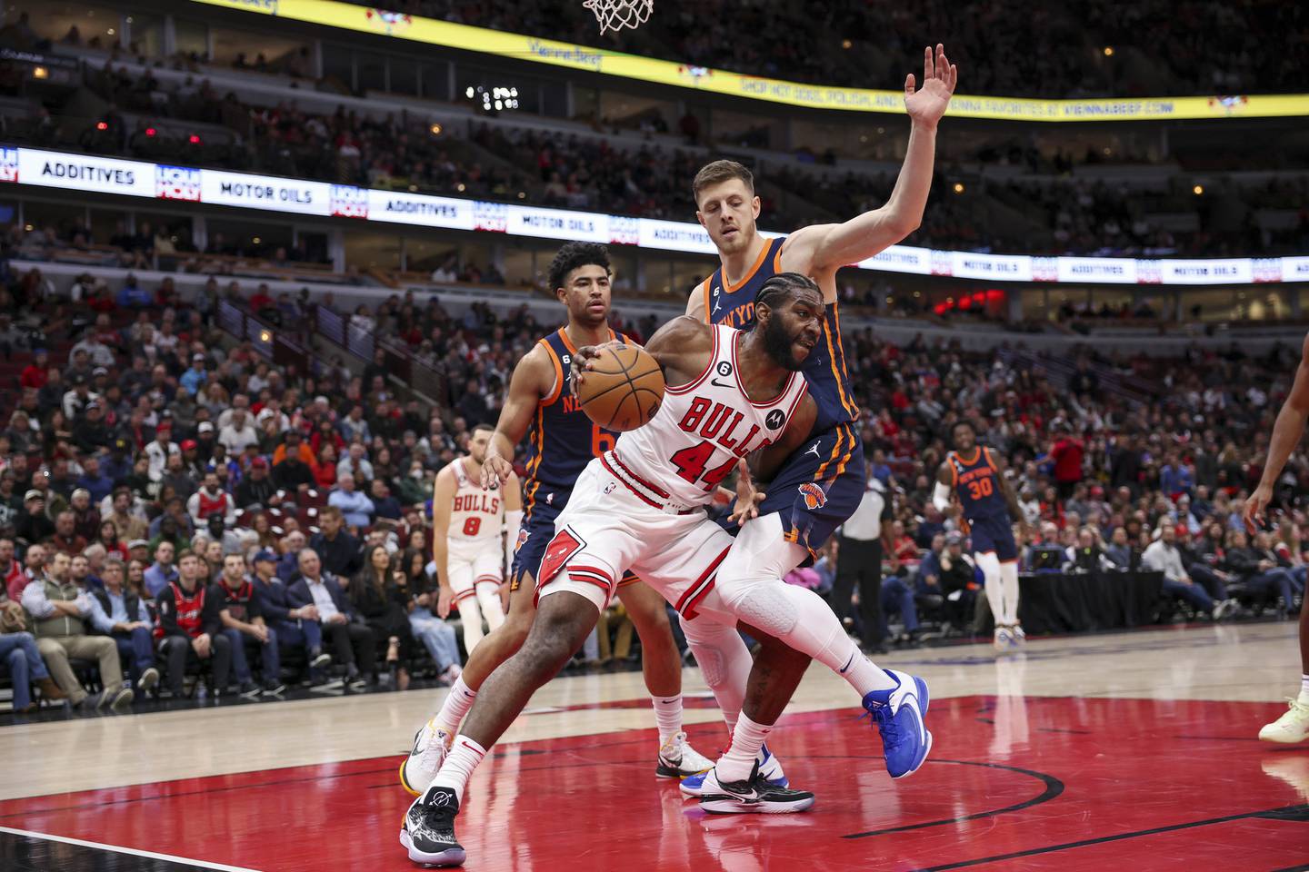 Bulls forward Patrick Williams (44) drives against Knicks center Isaiah Hartenstein during the first quarter on Dec. 14 at the United Center. 