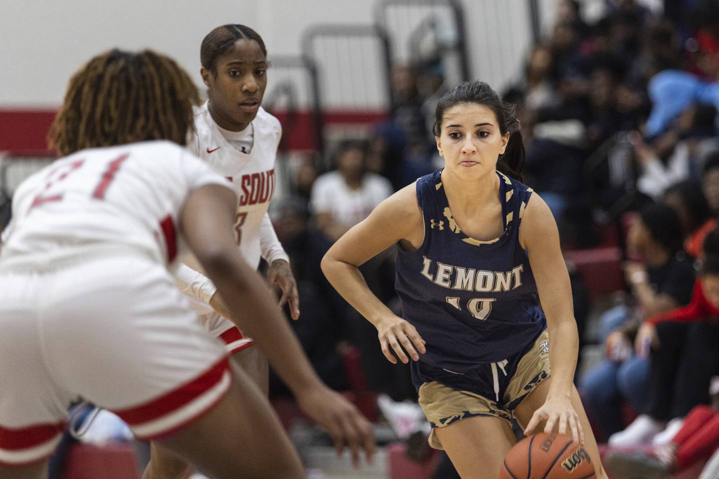 Lemont’s Bella Kedryna (10) dribbles the ball up the court against T.F. South during a South Suburban Blue game in Lansing on Thursday, Dec. 15, 2022.