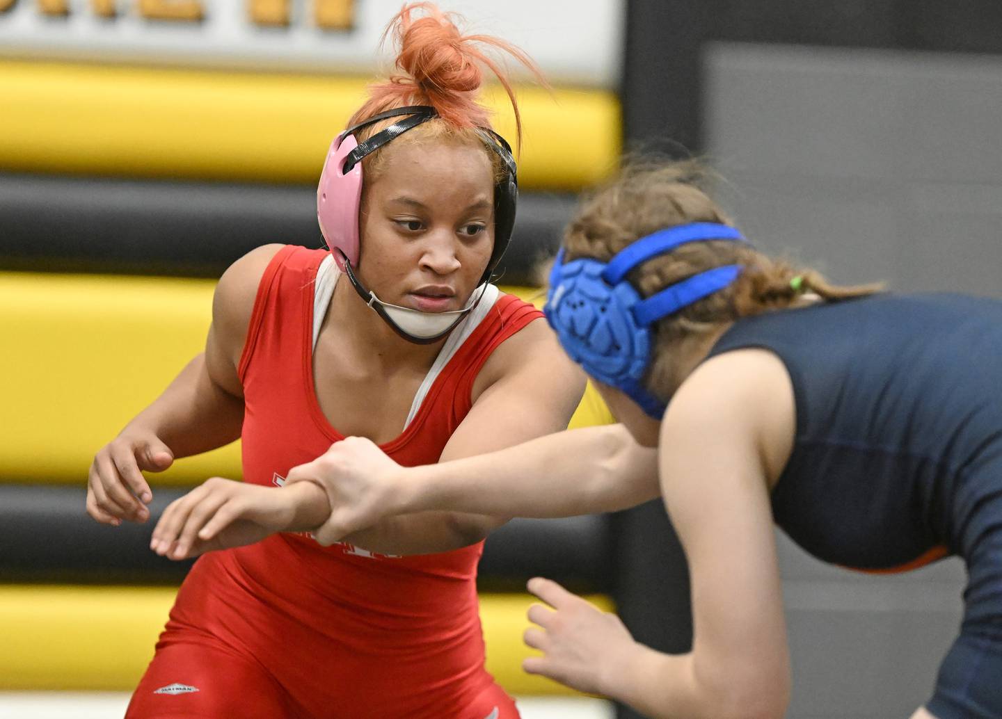 Homewood-Flossmoor’s Attalia Watson-Castro battles in the 135-pound championship match of the Andrew Sectional in Tinley Park on Saturday, Feb. 12, 2022.