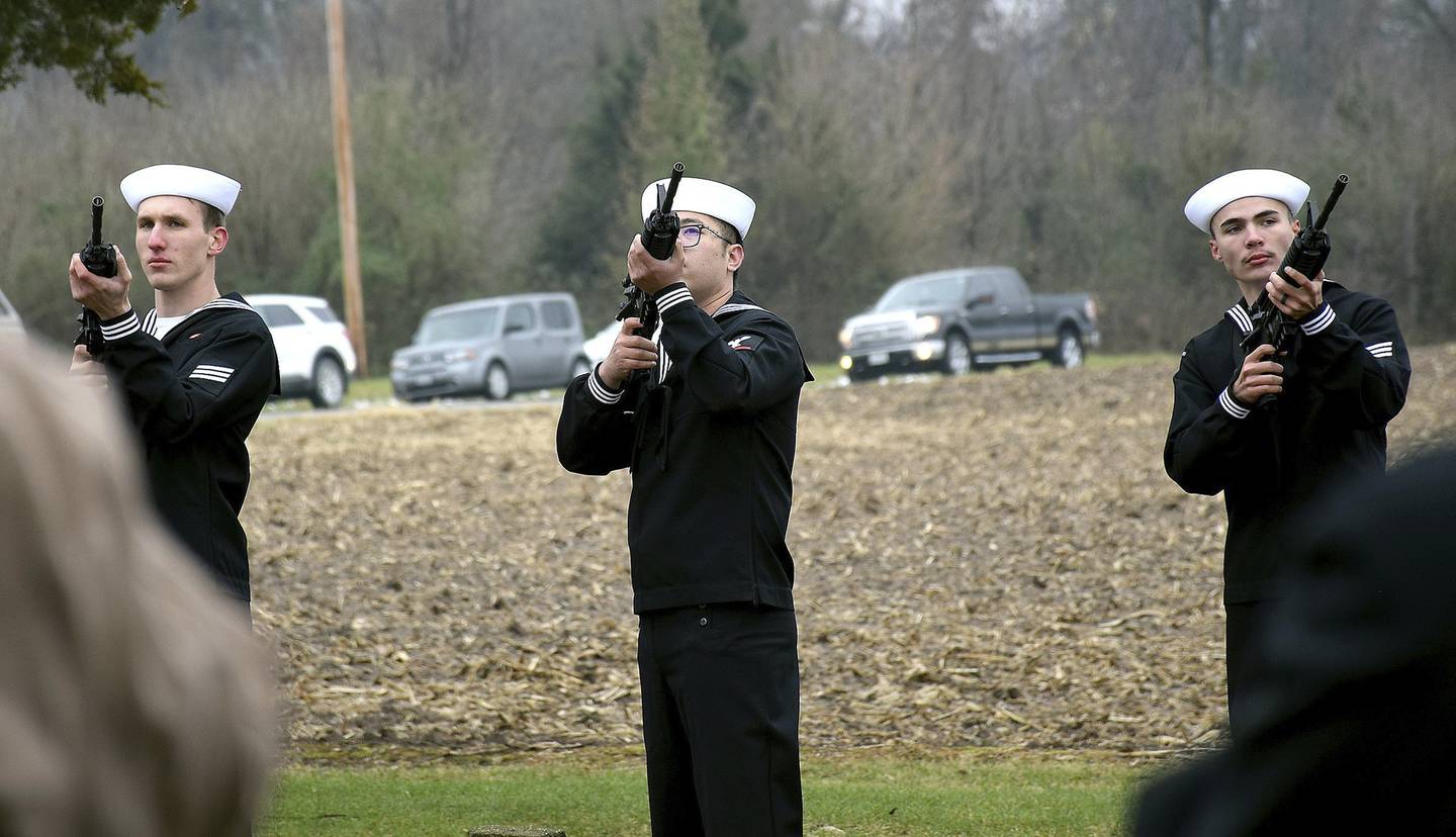 Sailors fire shots for World War II veteran Keith Tipsword's at his funeral at Moccasin Cemetery in downstate Moccasin.