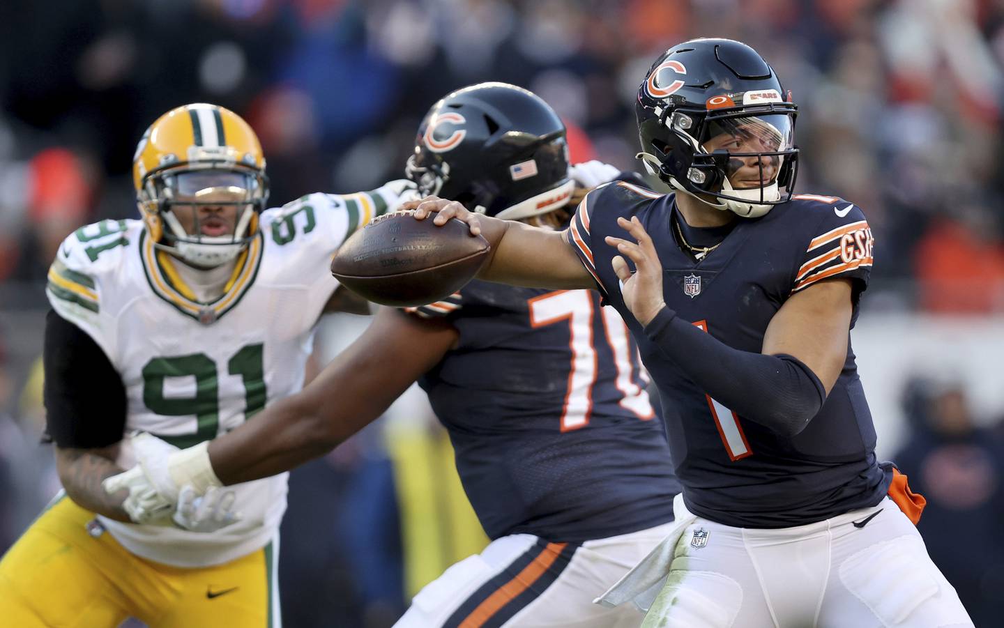 Bears quarterback Justin Fields (1) passes the ball in the fourth quarter against the Packers on Dec. 4 at Soldier Field. 