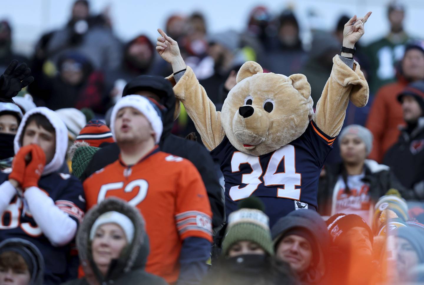 A Bears fan in a costume cheers in the fourth quarter of a game at Soldier Field on Dec. 4, 2022.