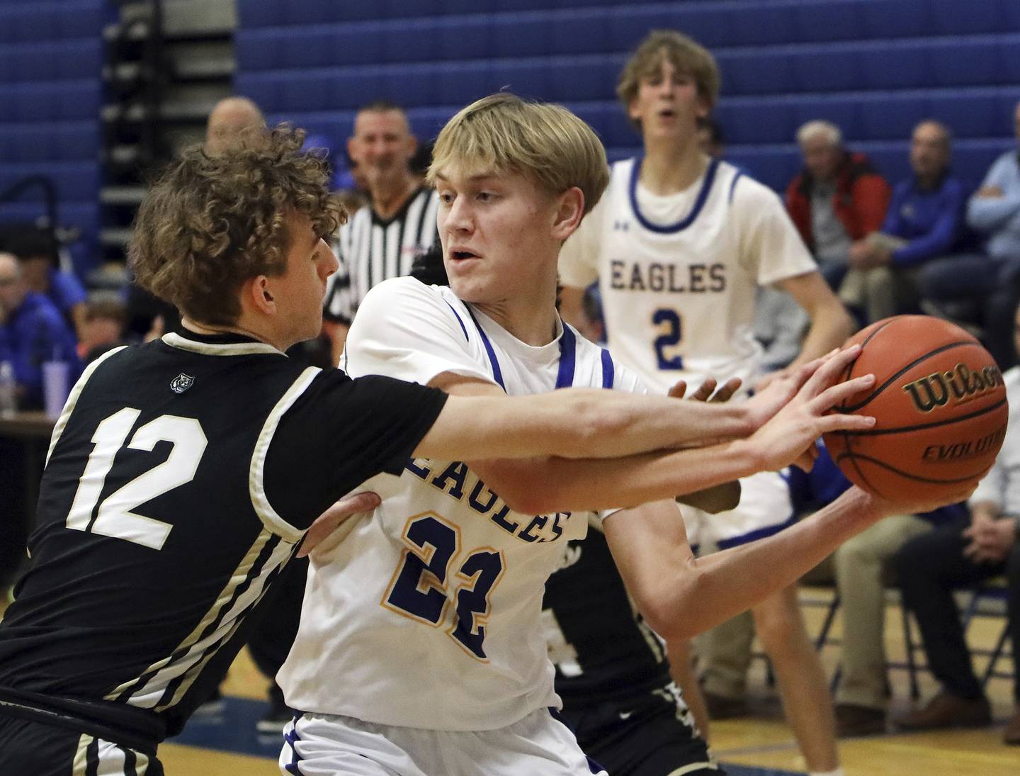 Sandburg's Paulius Mizeras (22) makes a move to the basket as Oak Forest's Owen Otstott (12) defends during a nonconference game in Orland Park on Friday, Dec. 16, 2022.