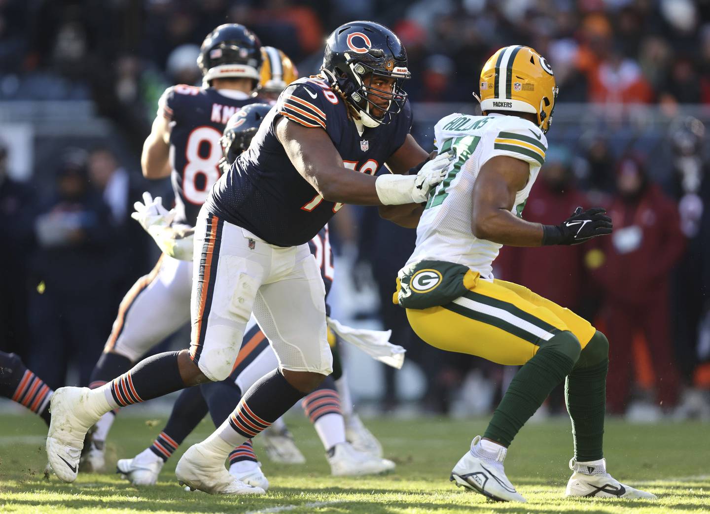 Bears offensive tackle Braxton Jones (70) makes a block against the Packers on Dec. 4, 2022, at Soldier Field.