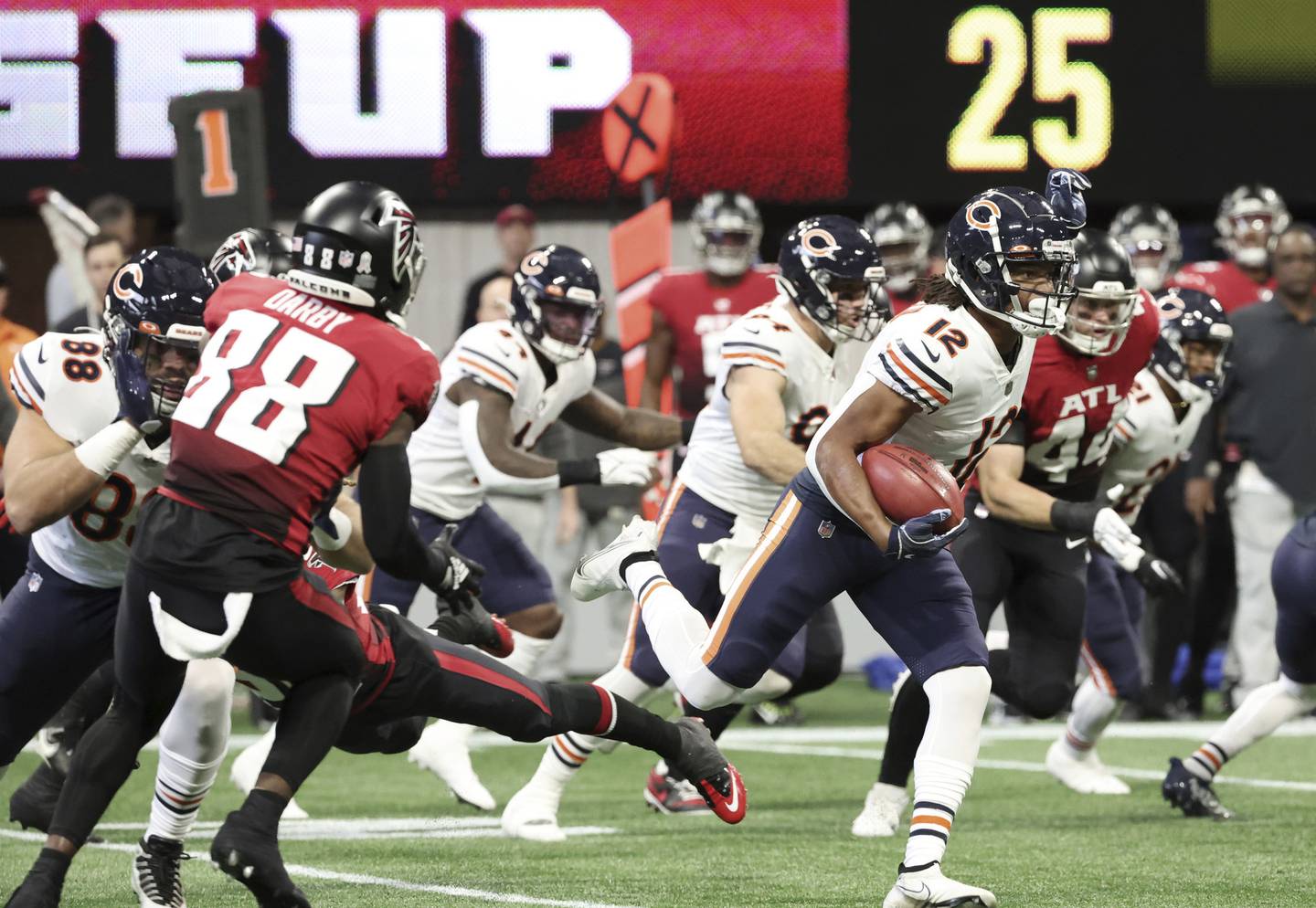 Bears wide receiver Velus Jones Jr. (12) returns a kickoff in the first quarter against the Falcons on Nov. 20, 2022, in Atlanta.