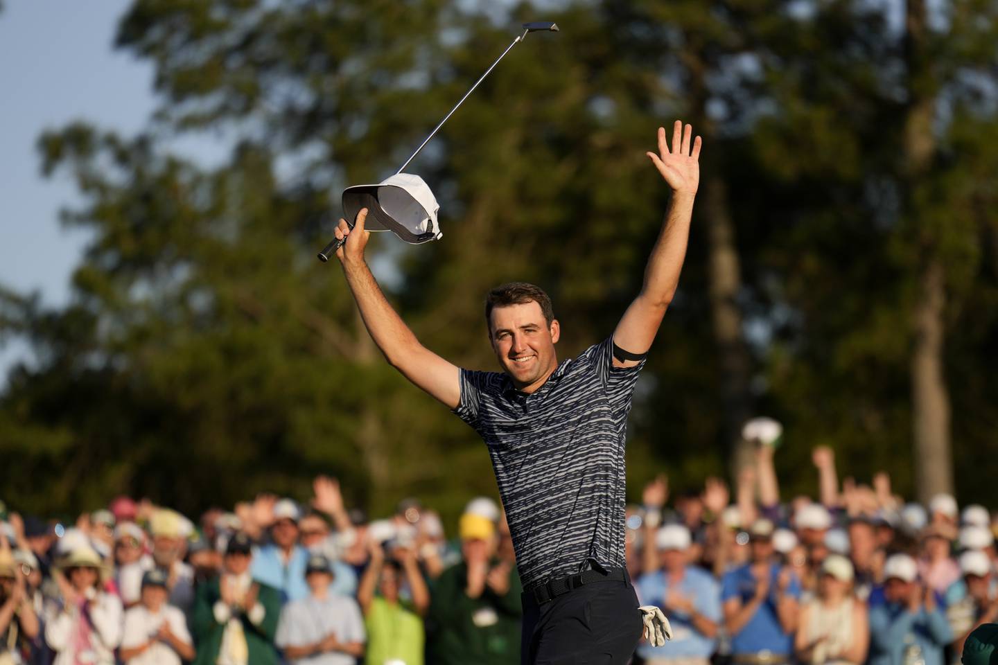 Scottie Scheffler celebrates after winning the Masters on April 10, 2022, in Augusta, Ga. 